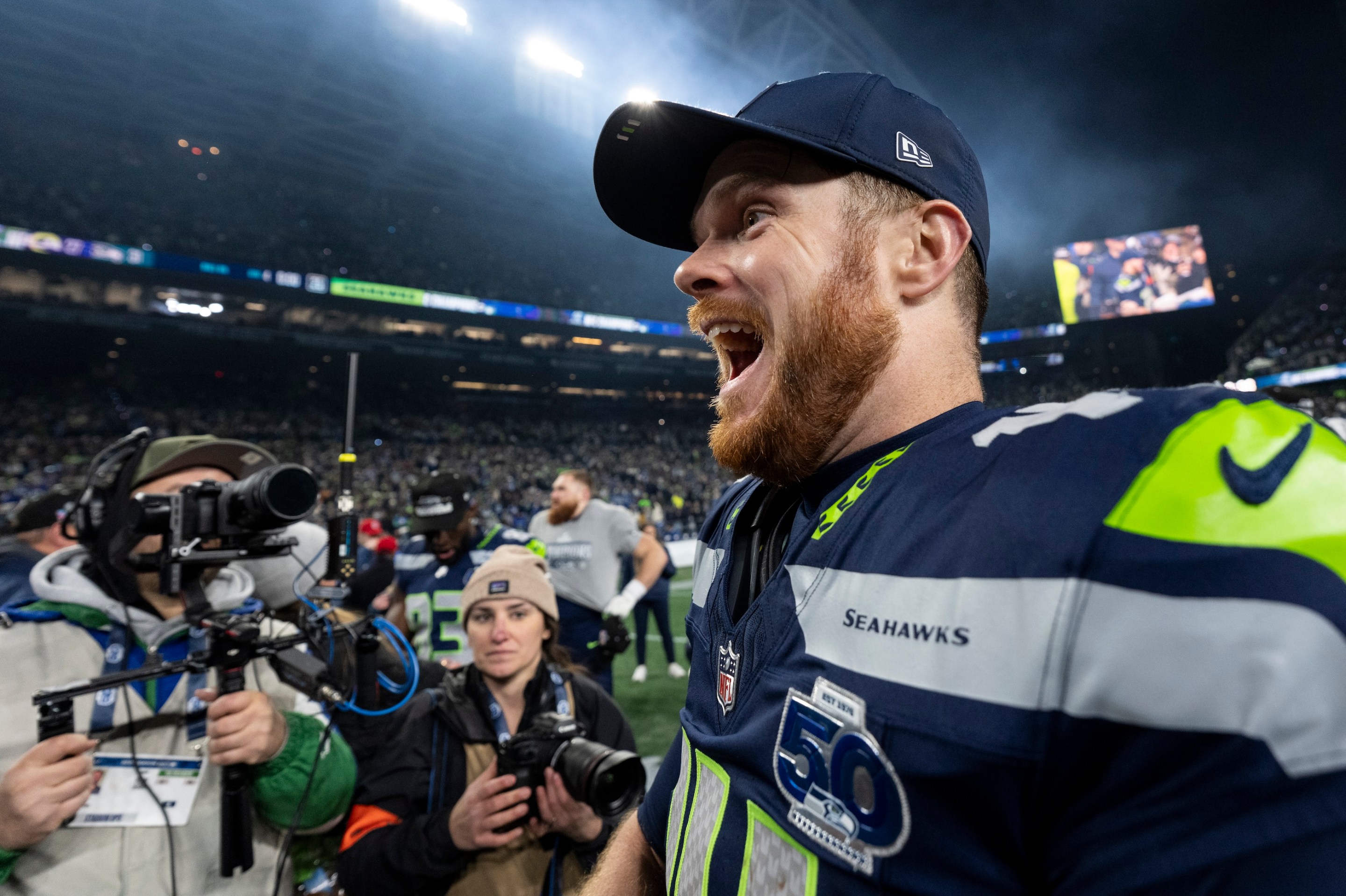 Sam Darnold of the Seattle Seahawks whoots enthusiastically following an NFC Championship NFL football game against the Los Angeles Rams at Lumen Field on January 25, 2026 in Seattle, Washington.
