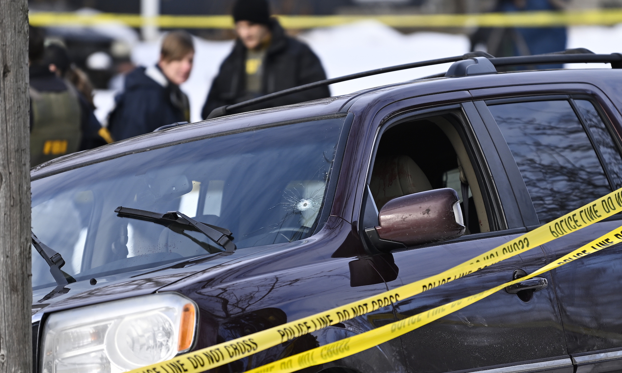 Police tape surrounds a vehicle suspected to be involved in a shooting by an ICE agent during federal law enforcement operations on January 07, 2026 in Minneapolis, Minnesota. According to federal officials, the agent, “fearing for his life” killed a woman during a confrontation in south Minneapolis.