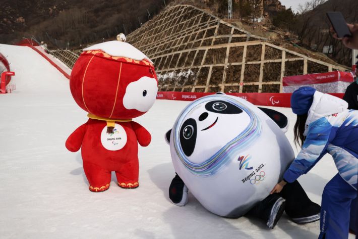 taff members dressed up as Beijing 2022 Winter Olympics mascot Bing Dwen Dwen (R) and Beijing 2022 Winter Paralympics mascot Shuey Rhon Rhon are seen at National Alpine Ski Centre