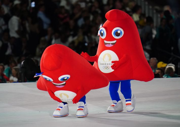 Performers dressed as the 2024 Paris Paralympic Games mascot Phryge on stage during the opening ceremony of the Paris 2024 Olympic Games . looking very huntable