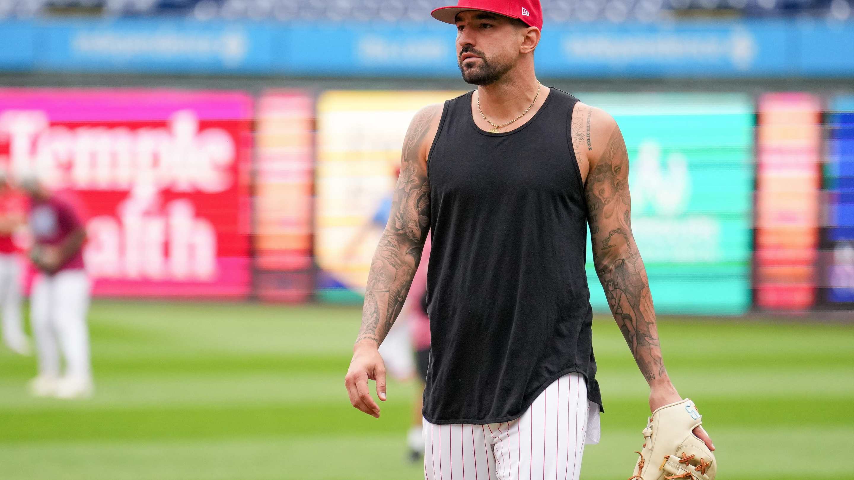nick castellanos in a black tanktop on the field during warm ups