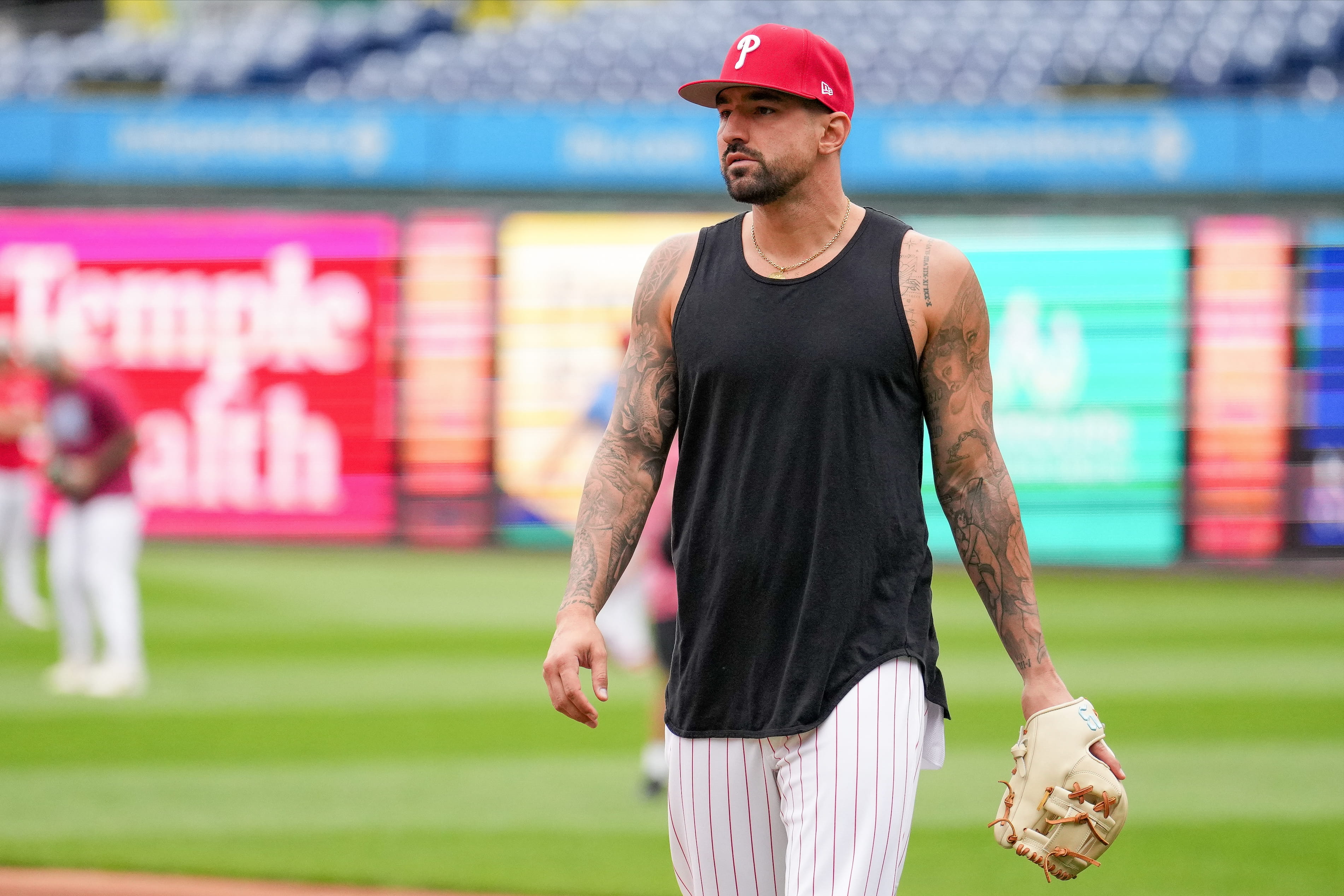 nick castellanos in a black tanktop on the field during warm ups