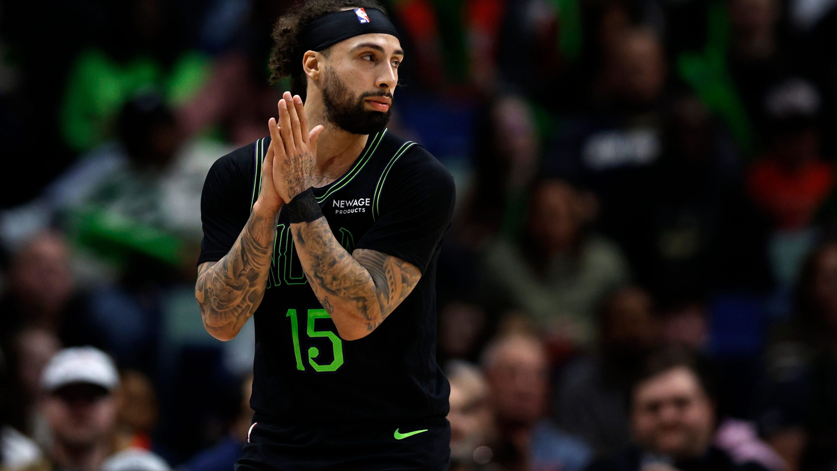 Jose Alvarado #15 of the New Orleans Pelicans stands on the court during a NBA game