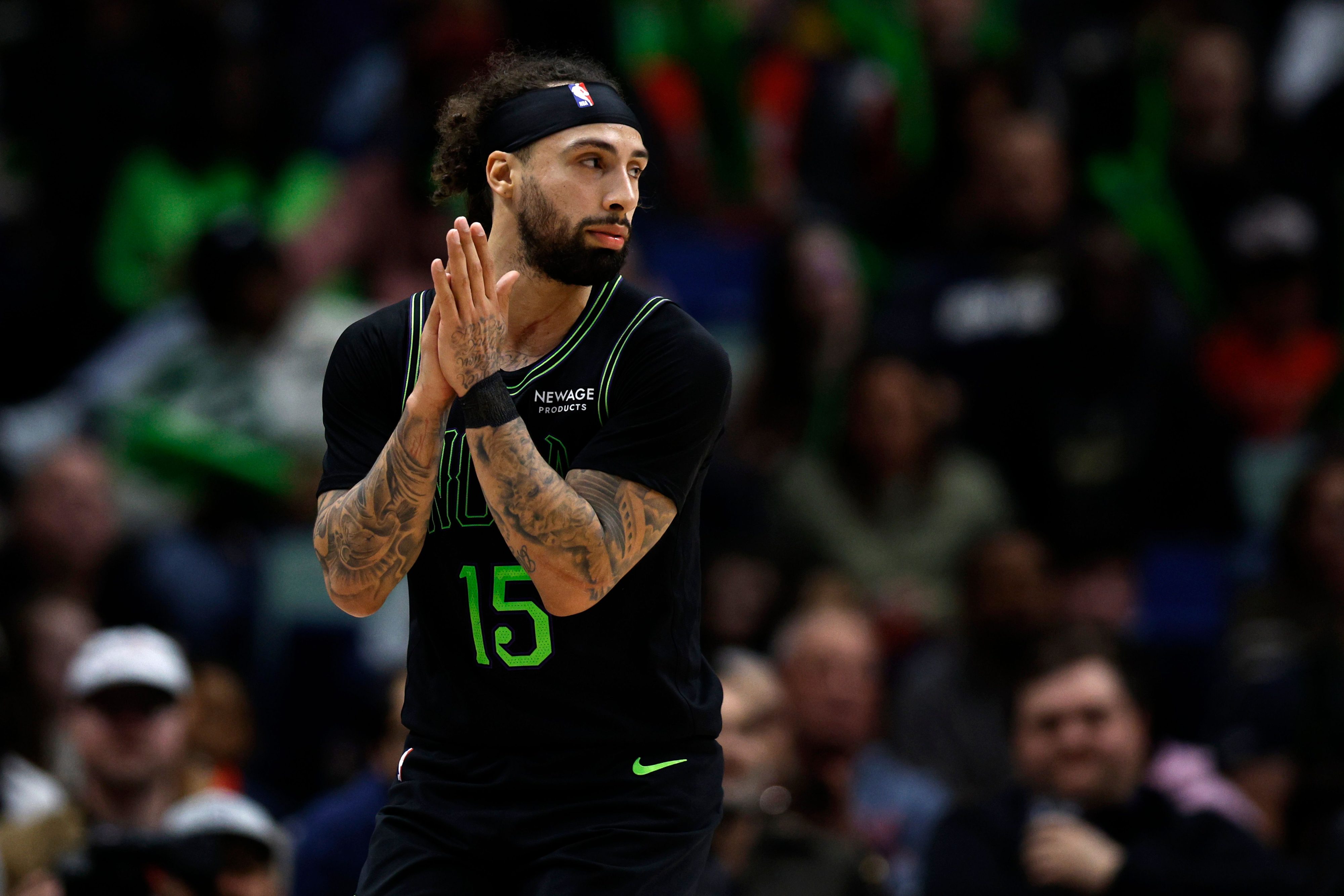 Jose Alvarado #15 of the New Orleans Pelicans stands on the court during a NBA game