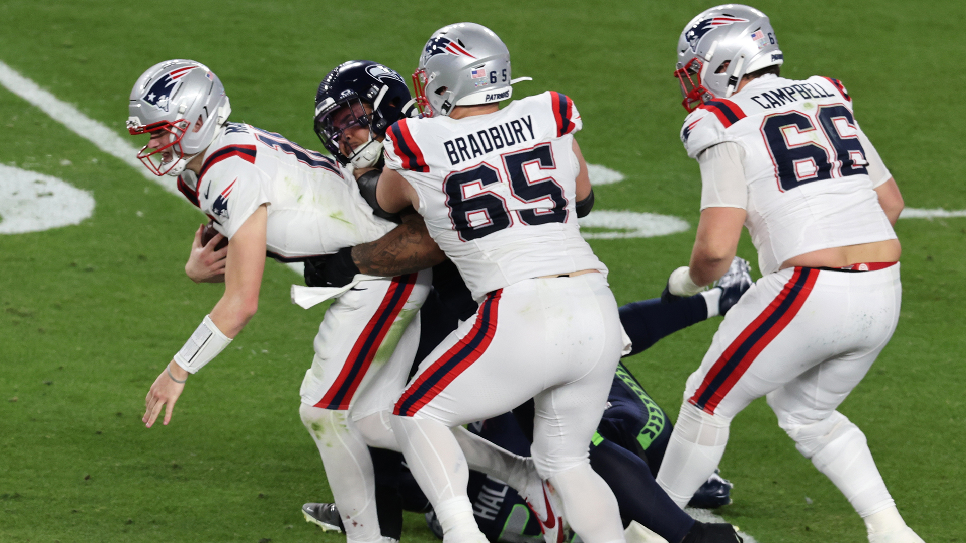 New England Patriots quarterback Drake Maye is sacked by Seattle Seahawks defensive tackle Byron Murphy II in the fourth quarter. The New England Patriots and Seattle Seahawks played in Super Bowl LX at Levi's Stadium on February 8, 2026.