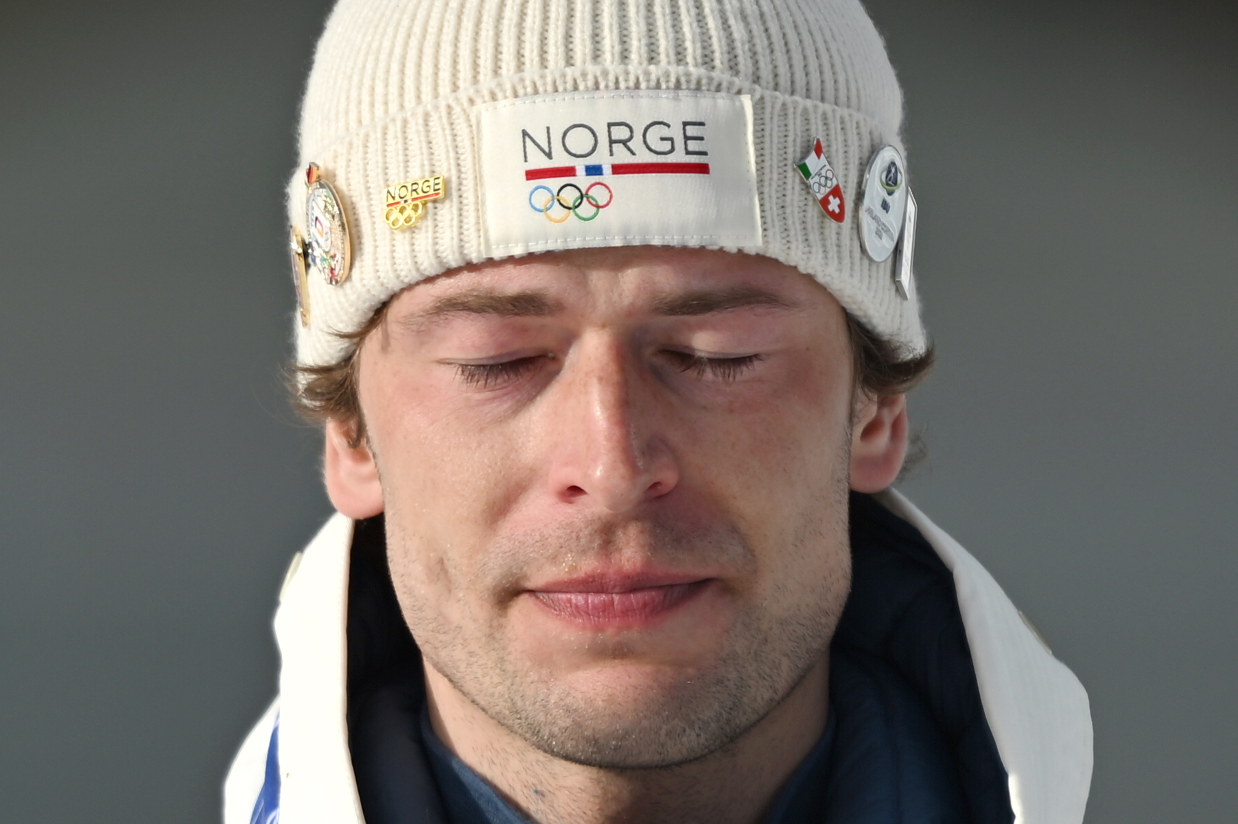 Sturla Holm Laegreid from Norway reacts emotionally at the award ceremony.