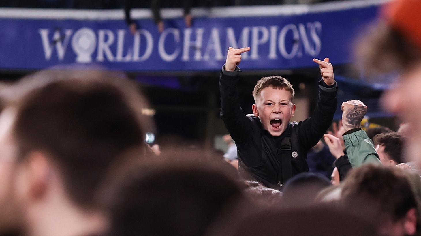 A child taunts the Chelsea fans during the Premier League match between Chelsea and Leeds United at Stamford Bridge on February 10, 2026 in London, United Kingdom.