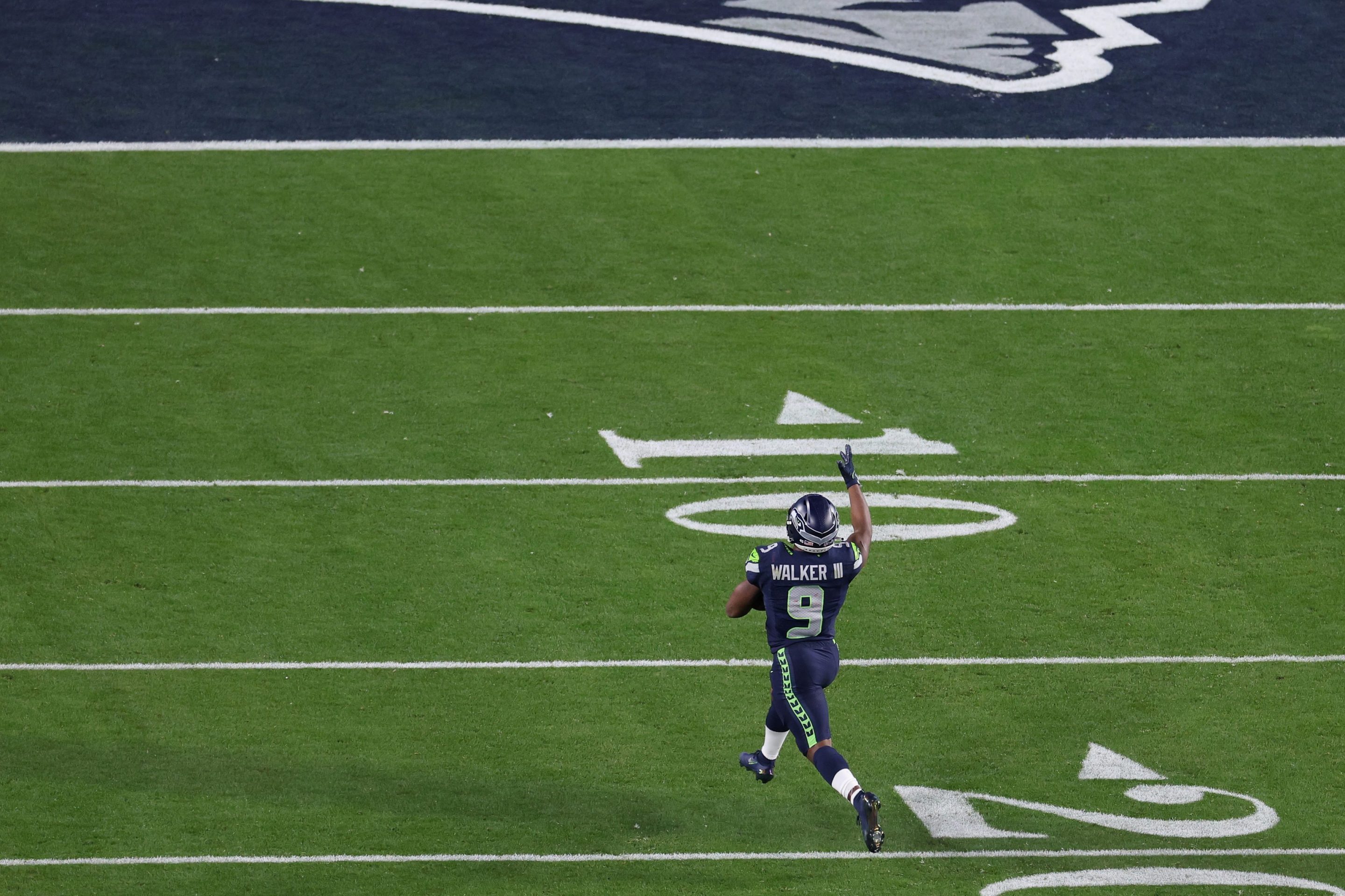 Kenneth Walker III #9 of the Seattle Seahawks runs for a touchdown that was called back during the fourth quarter against the New England Patriots in Super Bowl LX at Levi's Stadium on February 08, 2026 in Santa Clara, California.