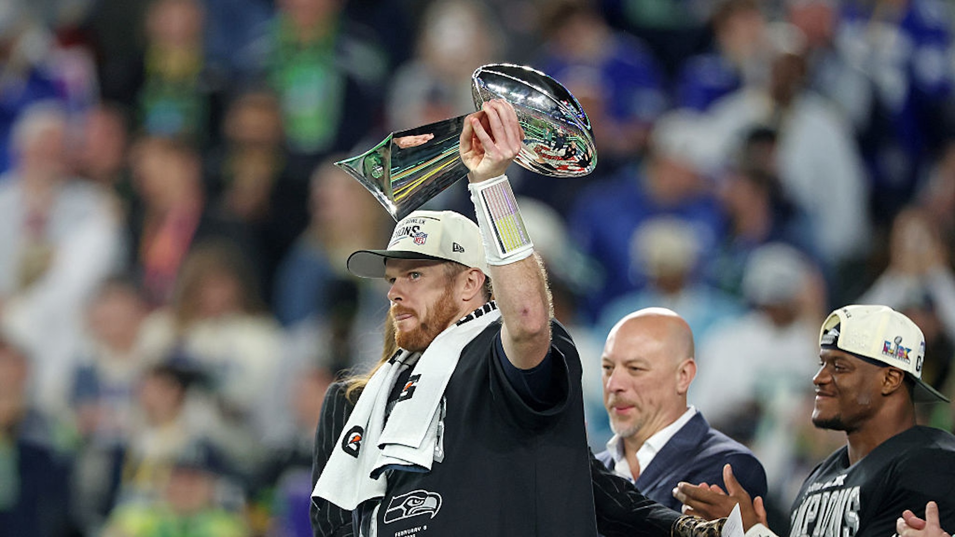 Sam Darnold lifts the lombardi trophy
