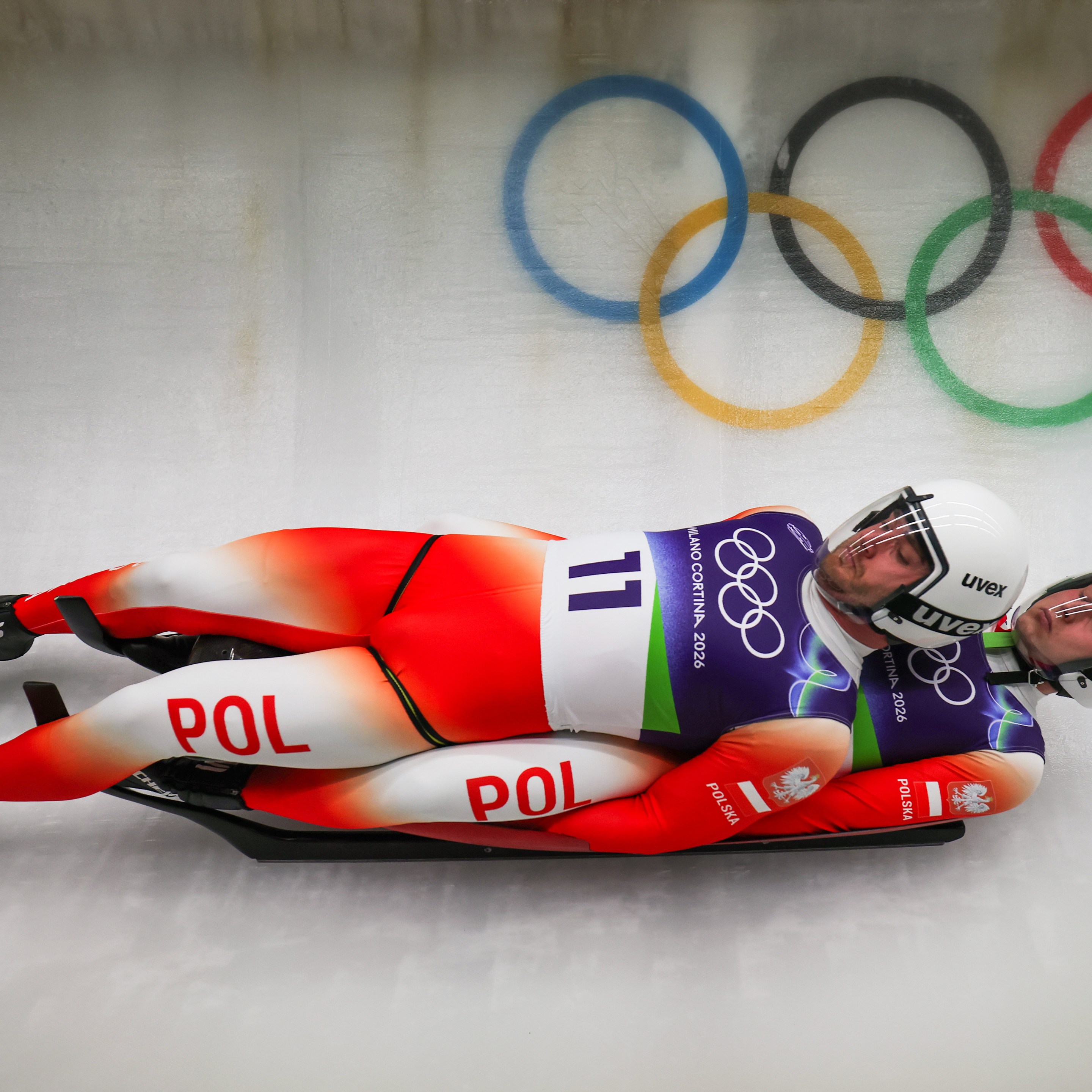 Wojciech Chmielewski and Michal Gancarczyk of Team Poland compete in the Men's Doubles Run 1 on day five of the Milano Cortina 2026 Winter Olympic games at Cortina Sliding Centre on February 11, 2026 in Cortina d'Ampezzo, Italy