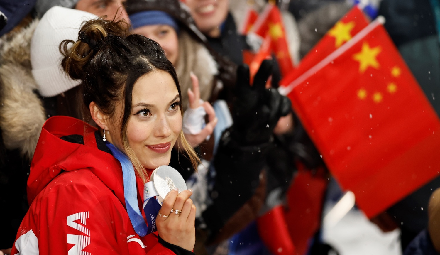 Silver medalist Gu Ailing of China poses for photos after the awarding ceremony of the freestyle skiing women's freeski big air event at the Milan-Cortina 2026 Olympic Winter Games in Livigno, Italy, Feb. 16, 2026. (Photo by Wang Peng/Xinhua via Getty Images)