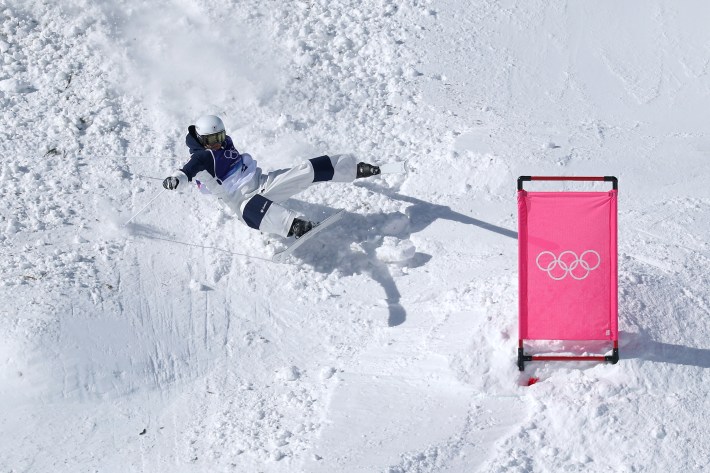 LIVIGNO, ITALY - FEBRUARY 15: Ikuma Horishima of Team Japan crashes as he competes in the Men's Dual Moguls 1/8 Finals against Nick Page of Team United States (not pictured) on day nine of the Milano Cortina 2026 Winter Olympic games at Livigno Air Park on February 15, 2026 in Livigno, Italy. (Photo by Patrick Smith/Getty Images)