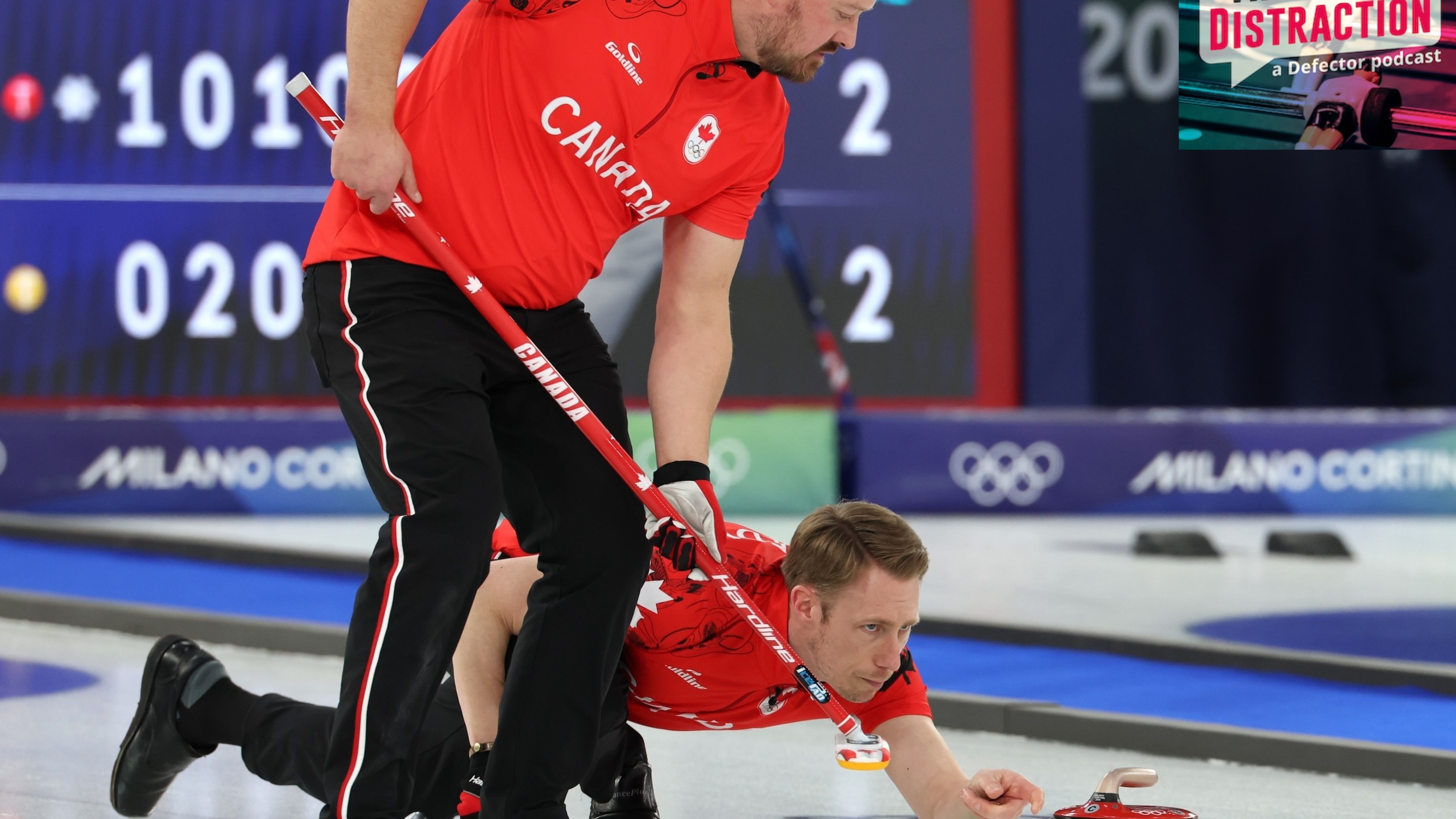 Marc Kennedy and Ben Hebert of Team Canada compete during Men's Round Robin between Team Canada and Team Great Britain on day eleven of the Milano Cortina 2026 Winter Olympic games at Cortina Curling Olympic Stadium on February 17, 2026.
