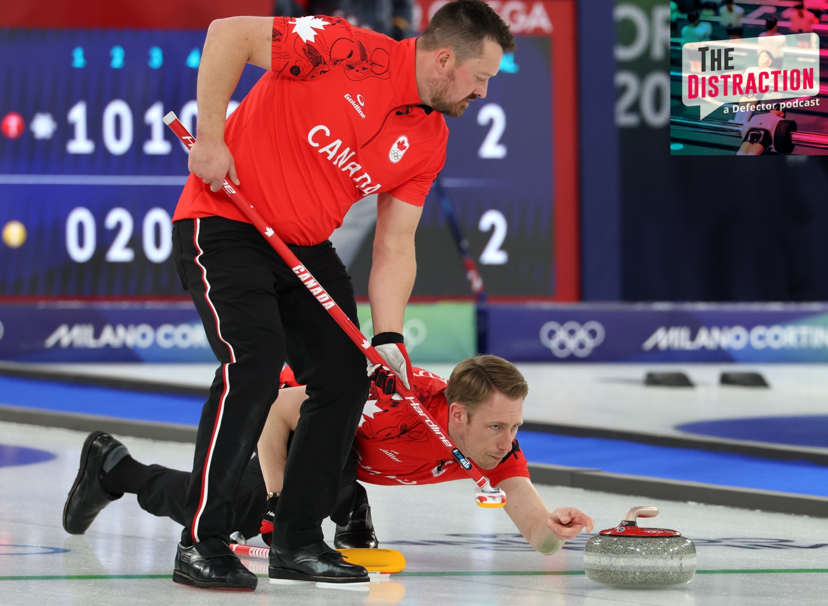 Marc Kennedy and Ben Hebert of Team Canada compete during Men's Round Robin between Team Canada and Team Great Britain on day eleven of the Milano Cortina 2026 Winter Olympic games at Cortina Curling Olympic Stadium on February 17, 2026.