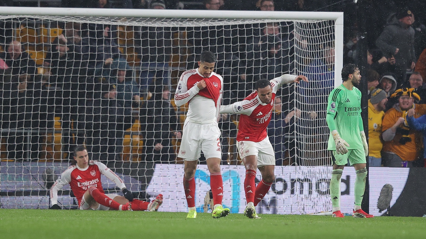 Players of Arsenal look dejected after conceding a second goal during the Premier League match between Wolverhampton Wanderers and Arsenal at Molineux on February 18, 2026 in Wolverhampton, England.