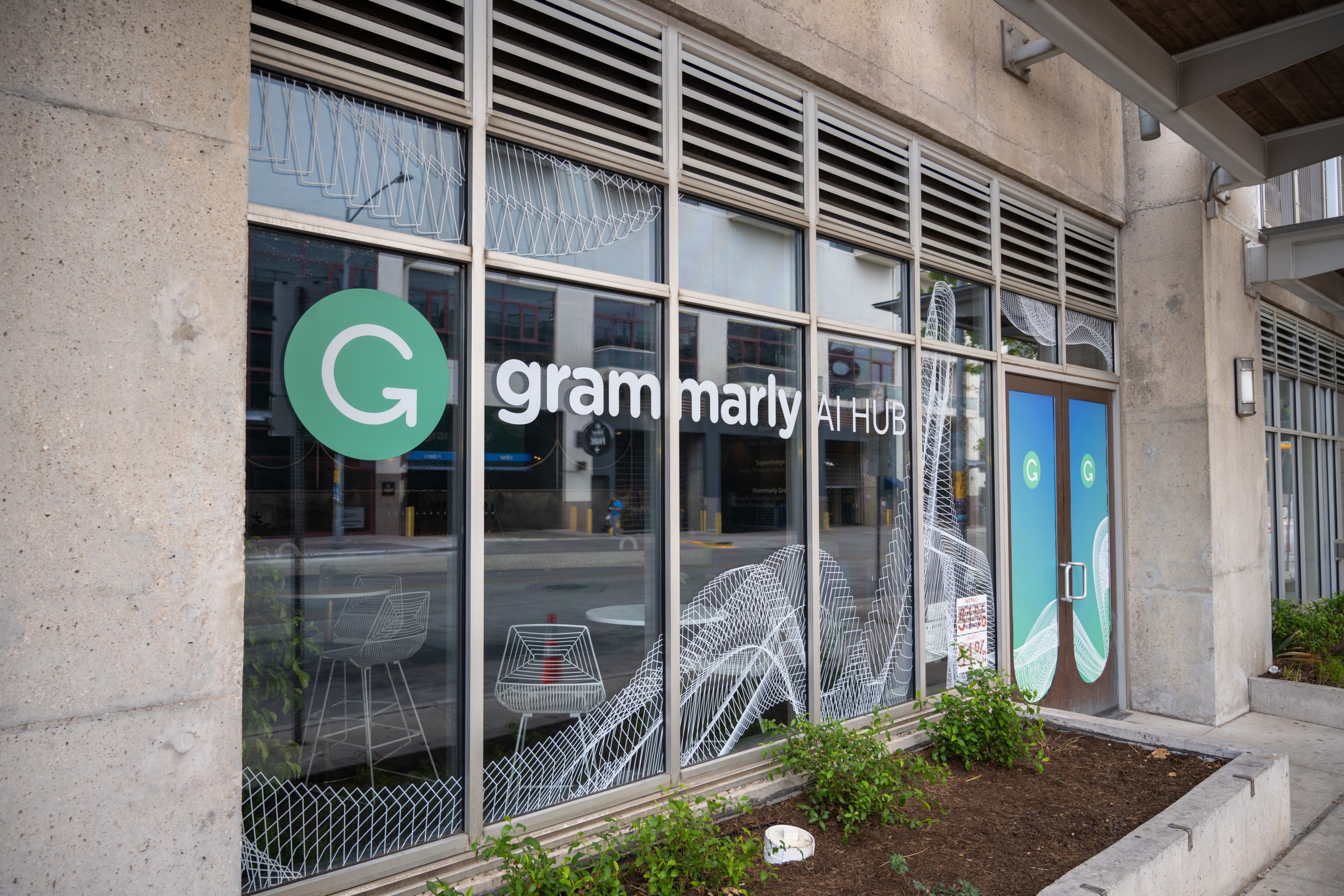 Logo for the AI text editing company Grammarly at the Grammarly AI Hub in Austin, Texas, March 11, 2023. (Photo by Smith Collection/Gado/Getty Images)
