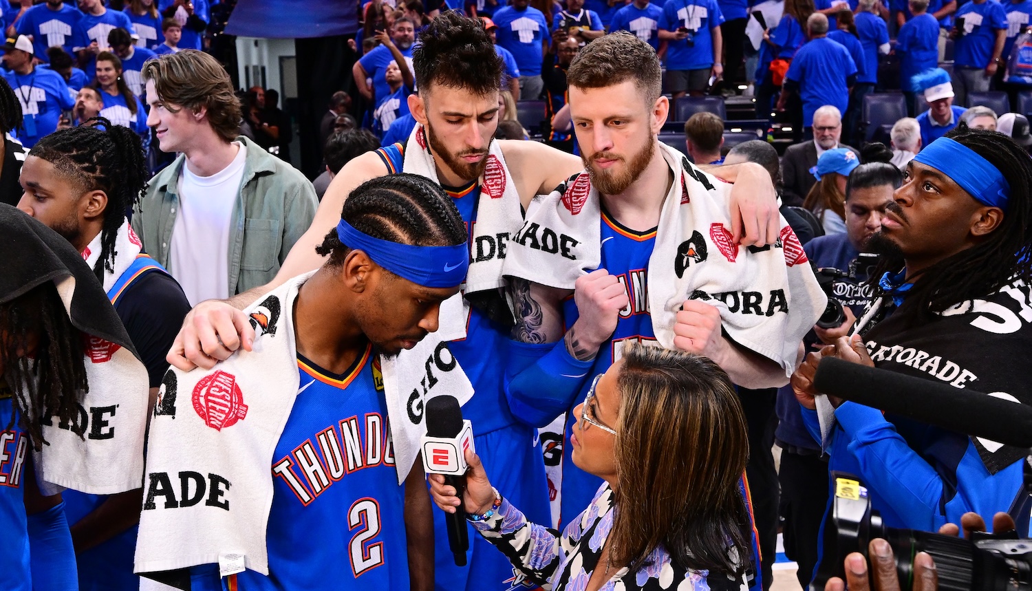 OKLAHOMA CITY, OKLAHOMA - MAY 18: Shai Gilgeous-Alexander #2 is interviewed with teammates Chet Holmgren #7 and Isaiah Hartenstein #55 of the Oklahoma City Thunder after beating the Denver Nuggets 125-93 in Game Seven of the Western Conference Second Round NBA Playoffs at Paycom Center on May 18, 2025 in Oklahoma City, Oklahoma. NOTE TO USER: User expressly acknowledges and agrees that, by downloading and or using this photograph, User is consenting to the terms and conditions of the Getty Images License Agreement. (Photo by Joshua Gateley/Getty Images)