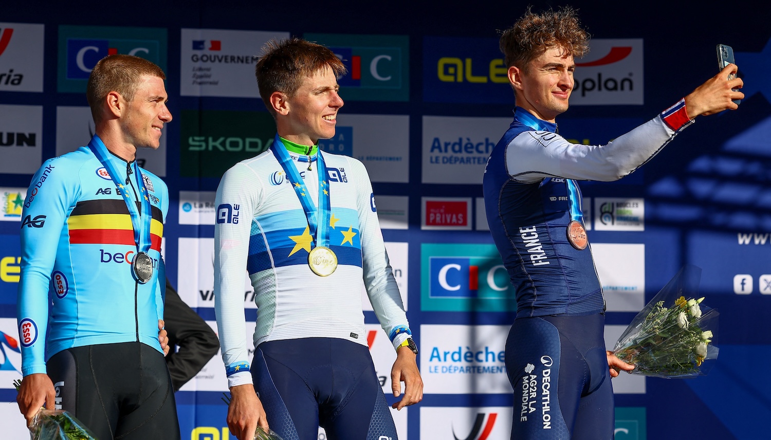 Belgium Remco Evenepoel, Slovenia Tadej Pogacar and France Paul Seixas pictured on the podium after the Men Elite raod race, a 202,5 km from Privas to Guilherand-Granges, at the UEC road European cycling championships, Sunday 05 October 2025, France. The European cycling championships Drome-Ardeche takes place from 1 to 5 October, France. BELGA PHOTO DAVID PINTENS (Photo by DAVID PINTENS / BELGA MAG / Belga via AFP)