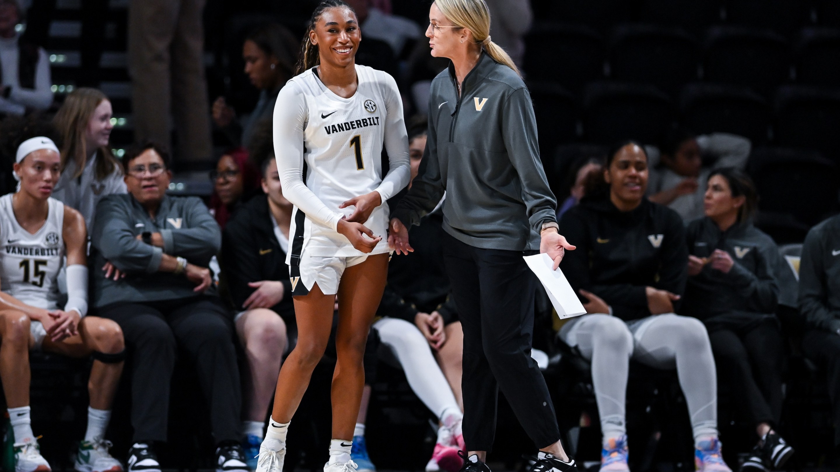 Mikayla Blakes #1 and head coach Shea Ralph of the Vanderbilt Commodores react on the sideline against the Furman Paladins in the first half at Vanderbilt University Memorial Gymnasium on November 10, 2025 in Nashville, Tennessee.