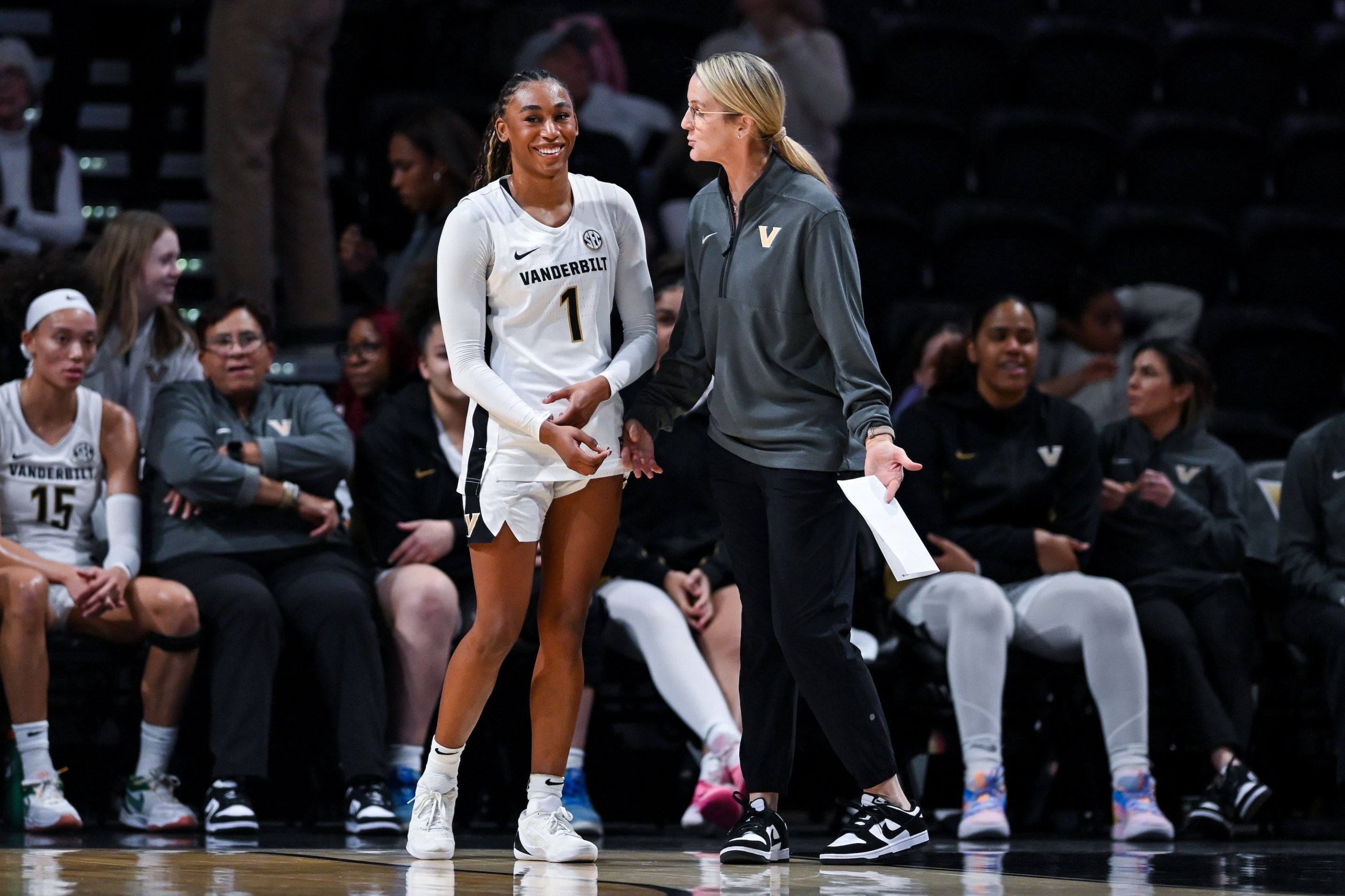 Mikayla Blakes #1 and head coach Shea Ralph of the Vanderbilt Commodores react on the sideline against the Furman Paladins in the first half at Vanderbilt University Memorial Gymnasium on November 10, 2025 in Nashville, Tennessee.