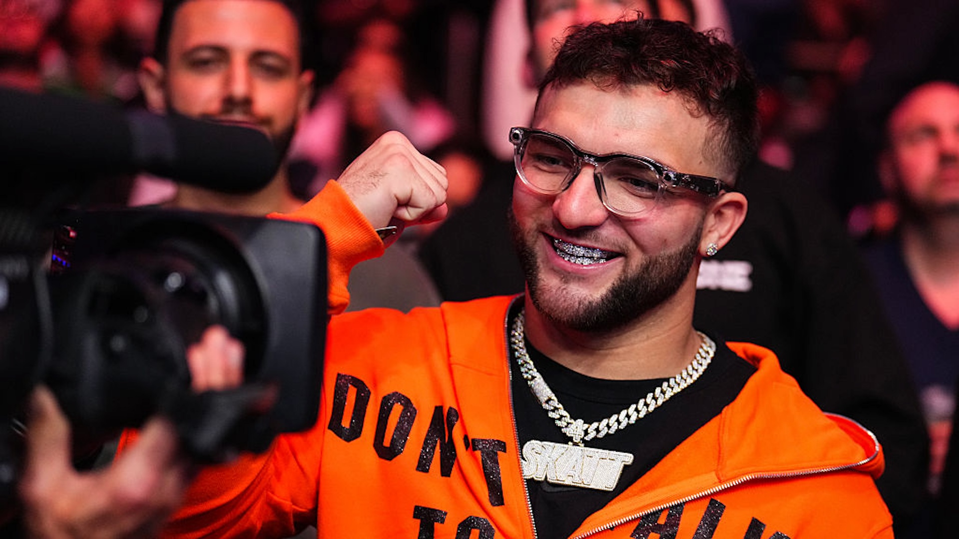 Cam Skattebo showing off his grill