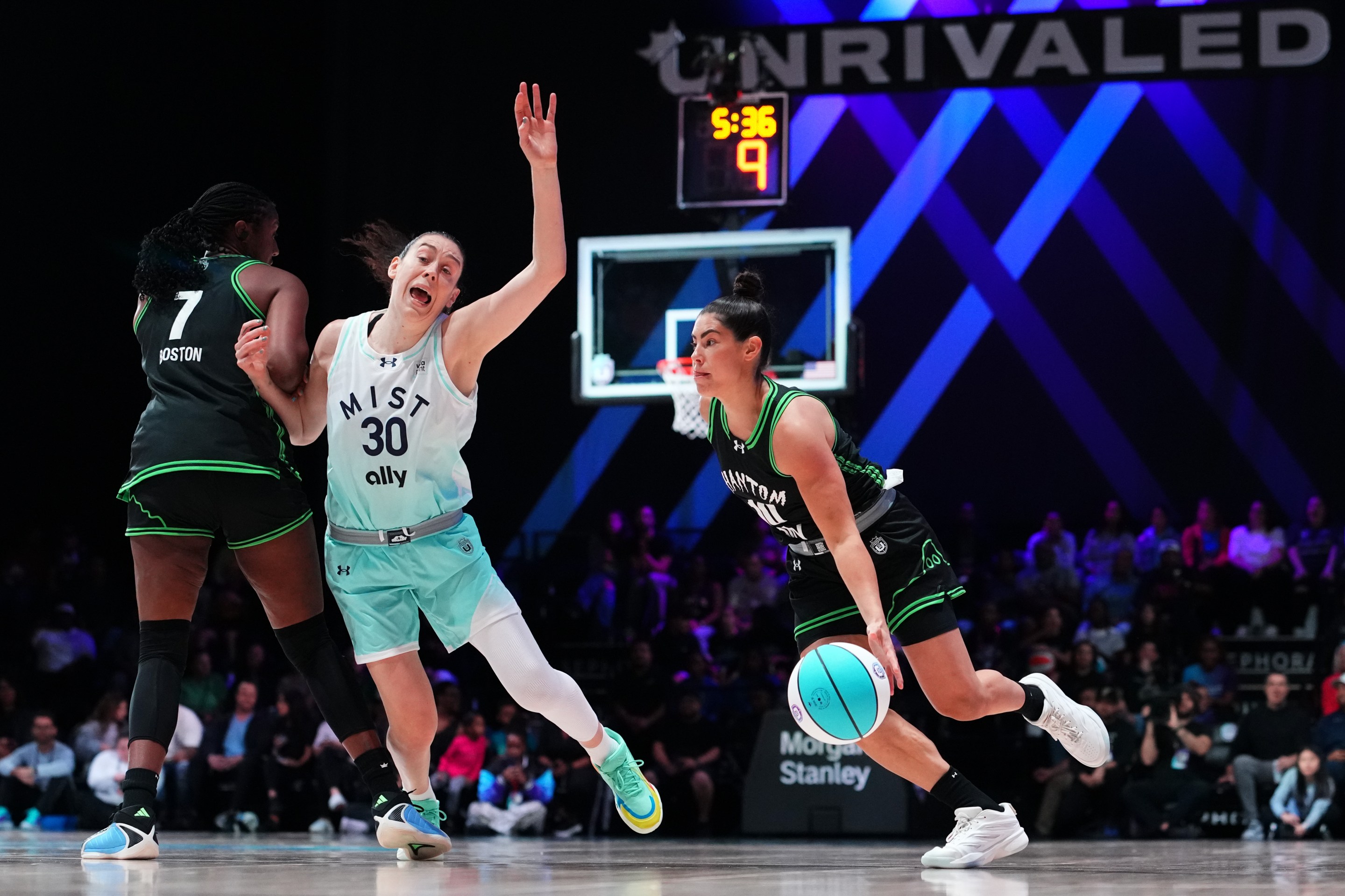 Kelsey Plum #10 of the Phantom dribbles the ball against Breanna Stewart #30 of the Mist during the first quarter of an Unrivaled 2026 at Sephora Arena on January 12, 2026 in Medley, Florida
