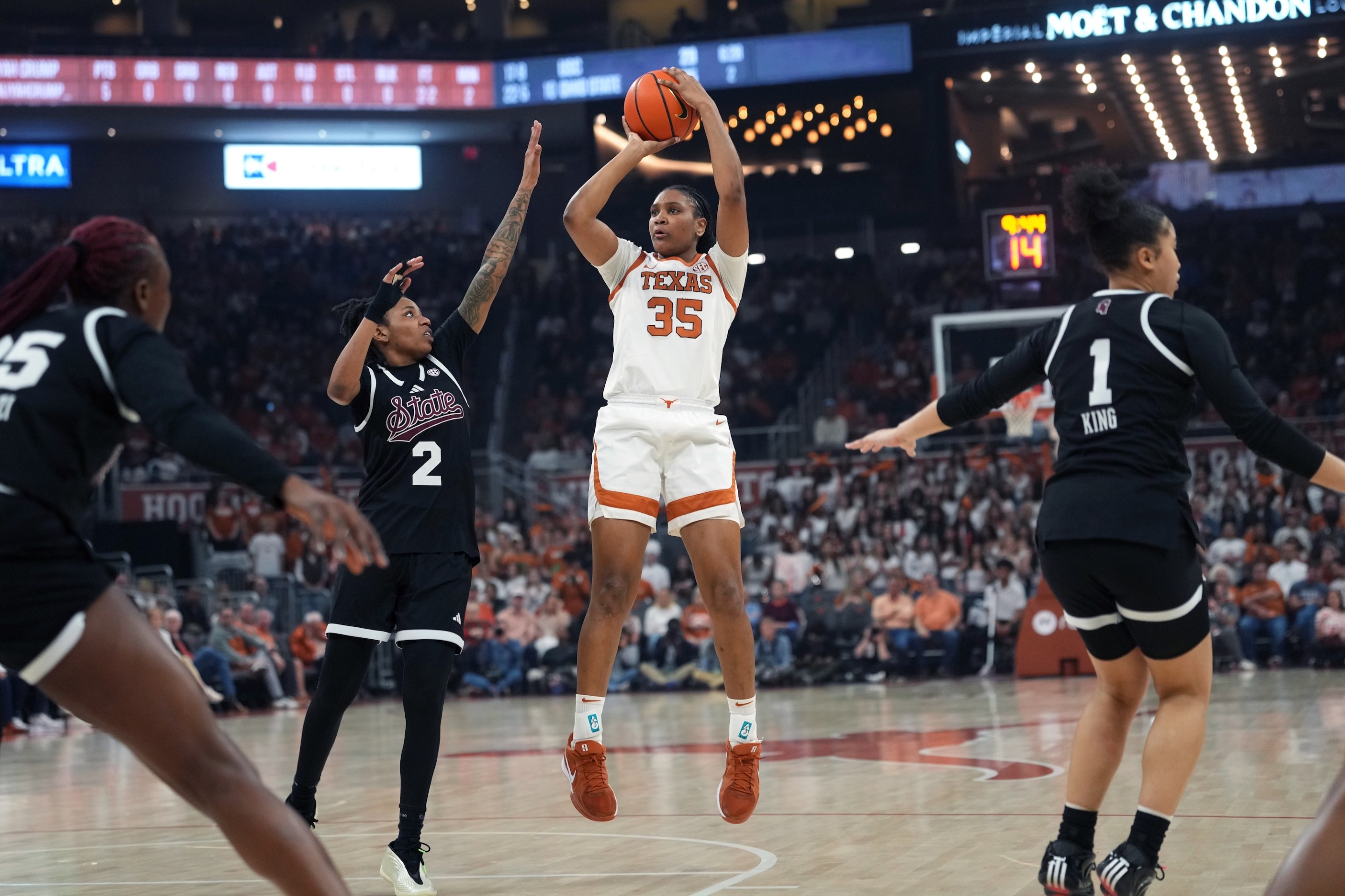 Madison Booker #35 of the Texas Longhorns shoots over Destiney McPhaul #2 of the Mississippi State Bulldogs during the first half at Moody Center on February 22, 2026 in Austin, Texas.