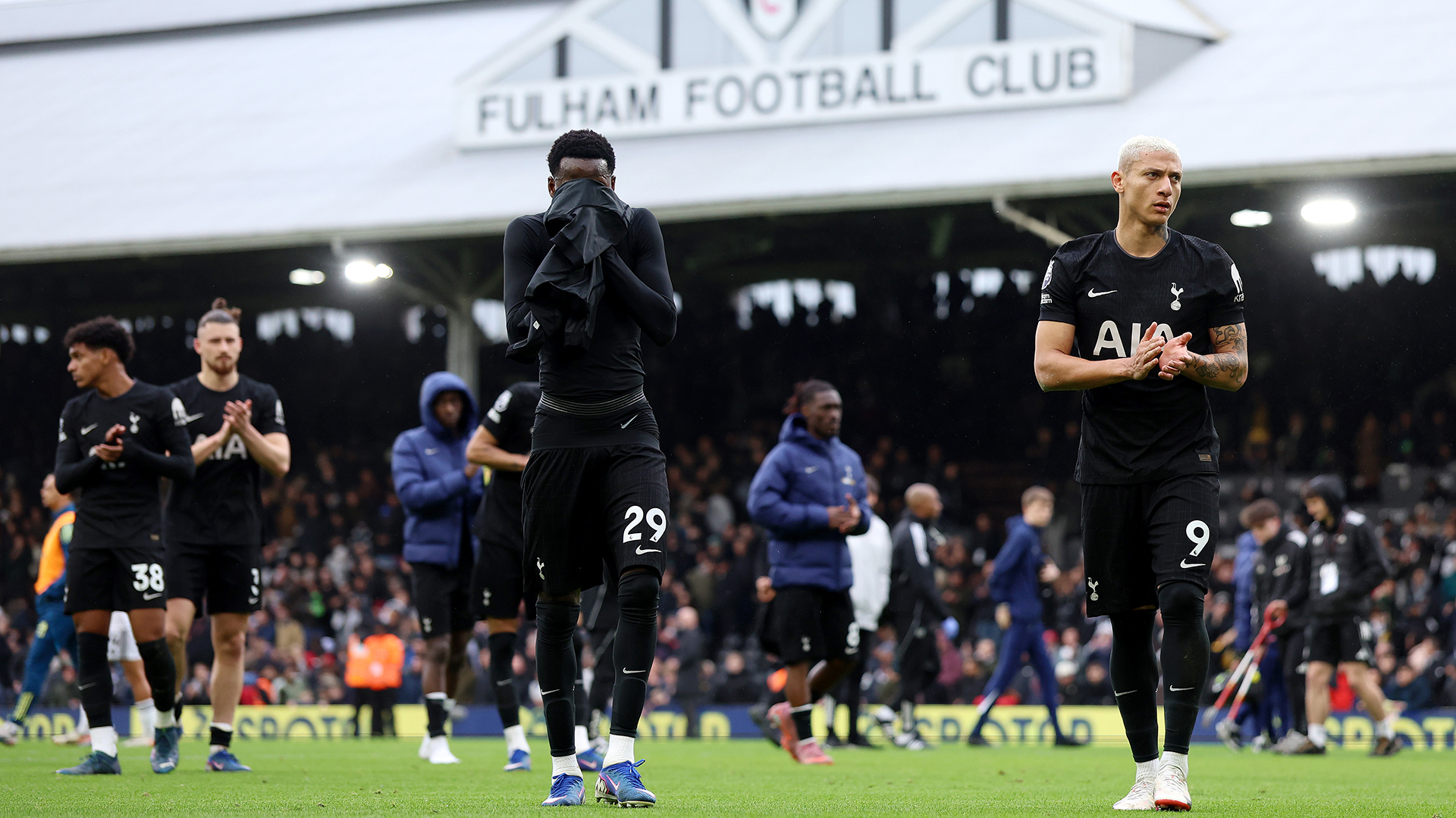 Pape Matar Sarr and Richarlison of Tottenham Hotspur look dejected after the team's defeat in the Premier League match between Fulham and Tottenham Hotspur at Craven Cottage on March 01, 2026 in London, England.