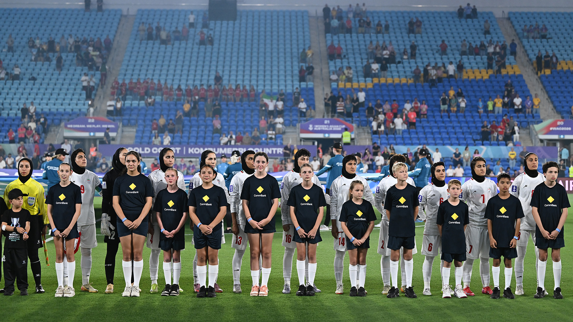Islamic Republic of Iran players take part in anthems during the AFC Women's Asian Cup Australia 2026 match between Korea Republic v Islamic Republic of Iran at Gold Coast Stadium on March 02, 2026 in Gold Coast, Australia.