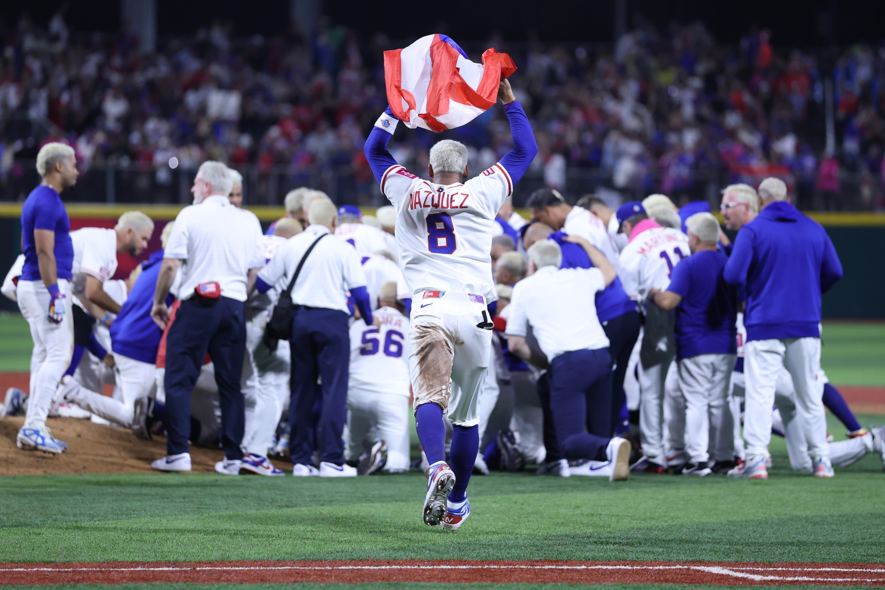 SAN JUAN, PUERTO RICO - MARCH 07: Luis Vázquez #8 of Team Puerto Rico celebrates after his team's 4-3 victory against Team Panama at Hiram Bithorn Stadium on March 07, 2026 in San Juan, Puerto Rico. (Photo by Al Bello/Getty Images)