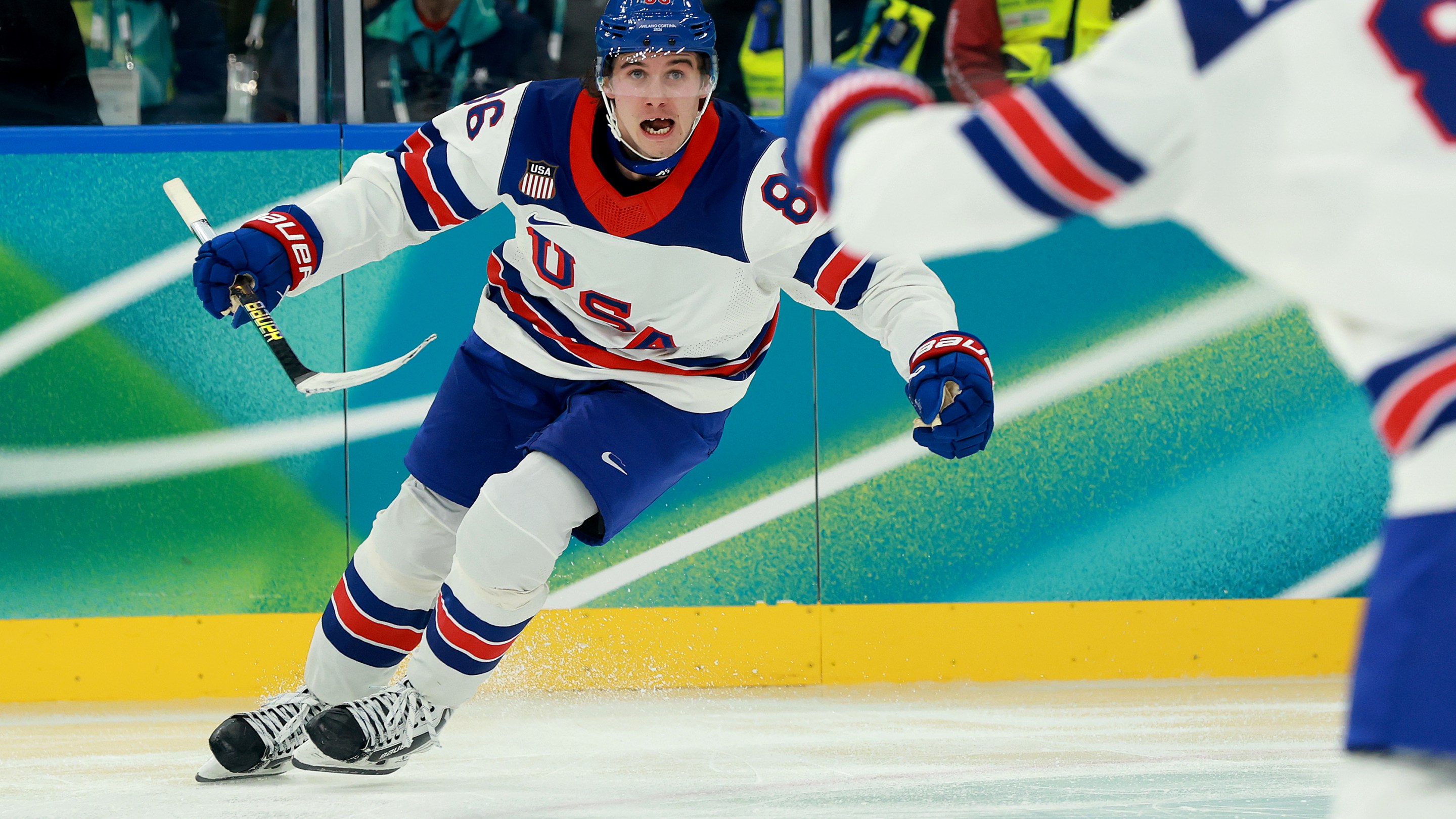 MILAN, ITALY - FEBRUARY 22: Jack Hughes #86 of Team United States celebrates scoring the game-winning goal in overtime during the Men's Gold Medal match between Canada and the United States on day 16 of the Milano Cortina 2026 Winter Olympic games at Milano Santagiulia Ice Hockey Arena on February 22, 2026 in Milan, Italy. Team United States defeated Team Canada 2-1 in overtime to win the Gold medal. (Photo by Elsa/Getty Images)