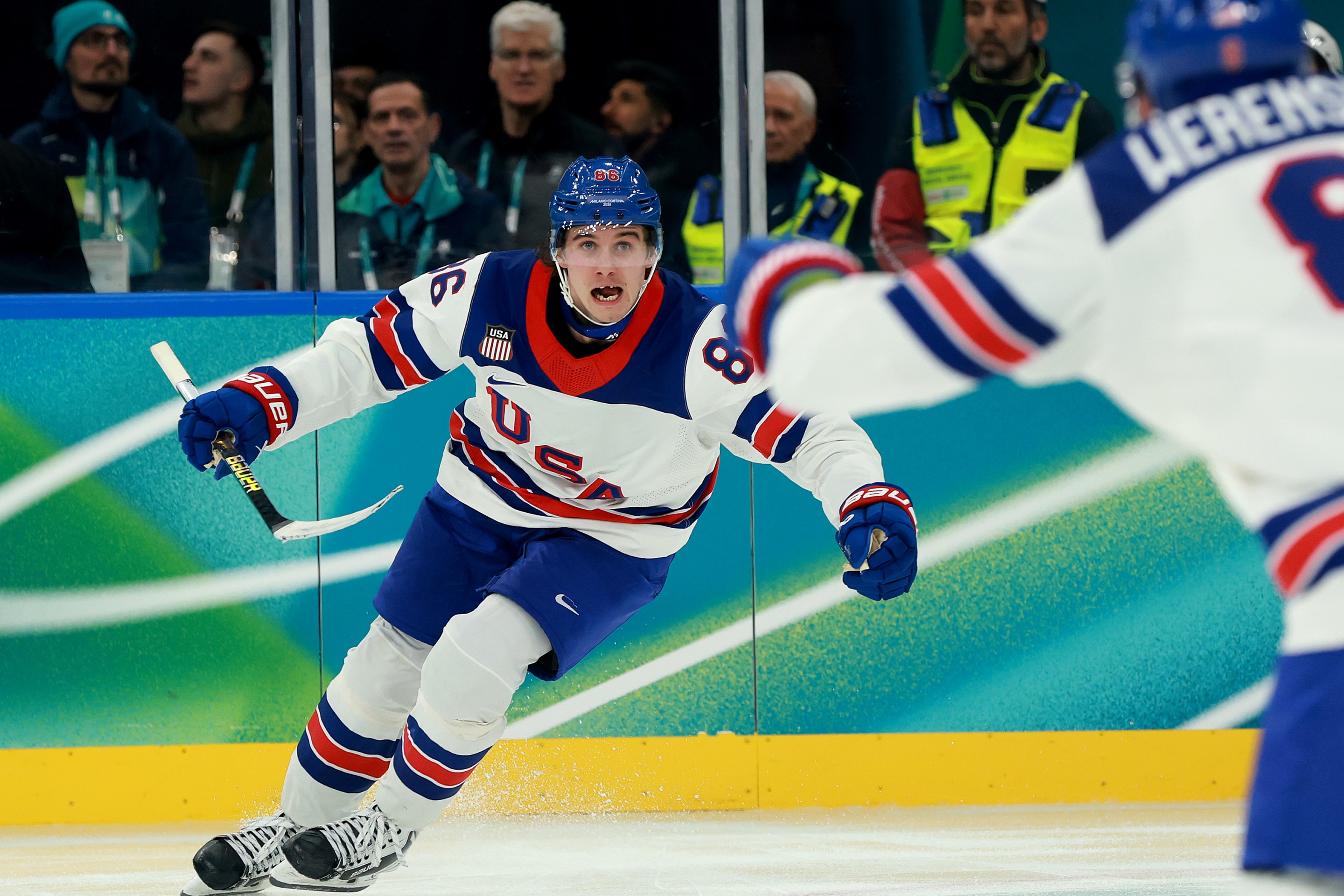 MILAN, ITALY - FEBRUARY 22: Jack Hughes #86 of Team United States celebrates scoring the game-winning goal in overtime during the Men's Gold Medal match between Canada and the United States on day 16 of the Milano Cortina 2026 Winter Olympic games at Milano Santagiulia Ice Hockey Arena on February 22, 2026 in Milan, Italy. Team United States defeated Team Canada 2-1 in overtime to win the Gold medal. (Photo by Elsa/Getty Images)