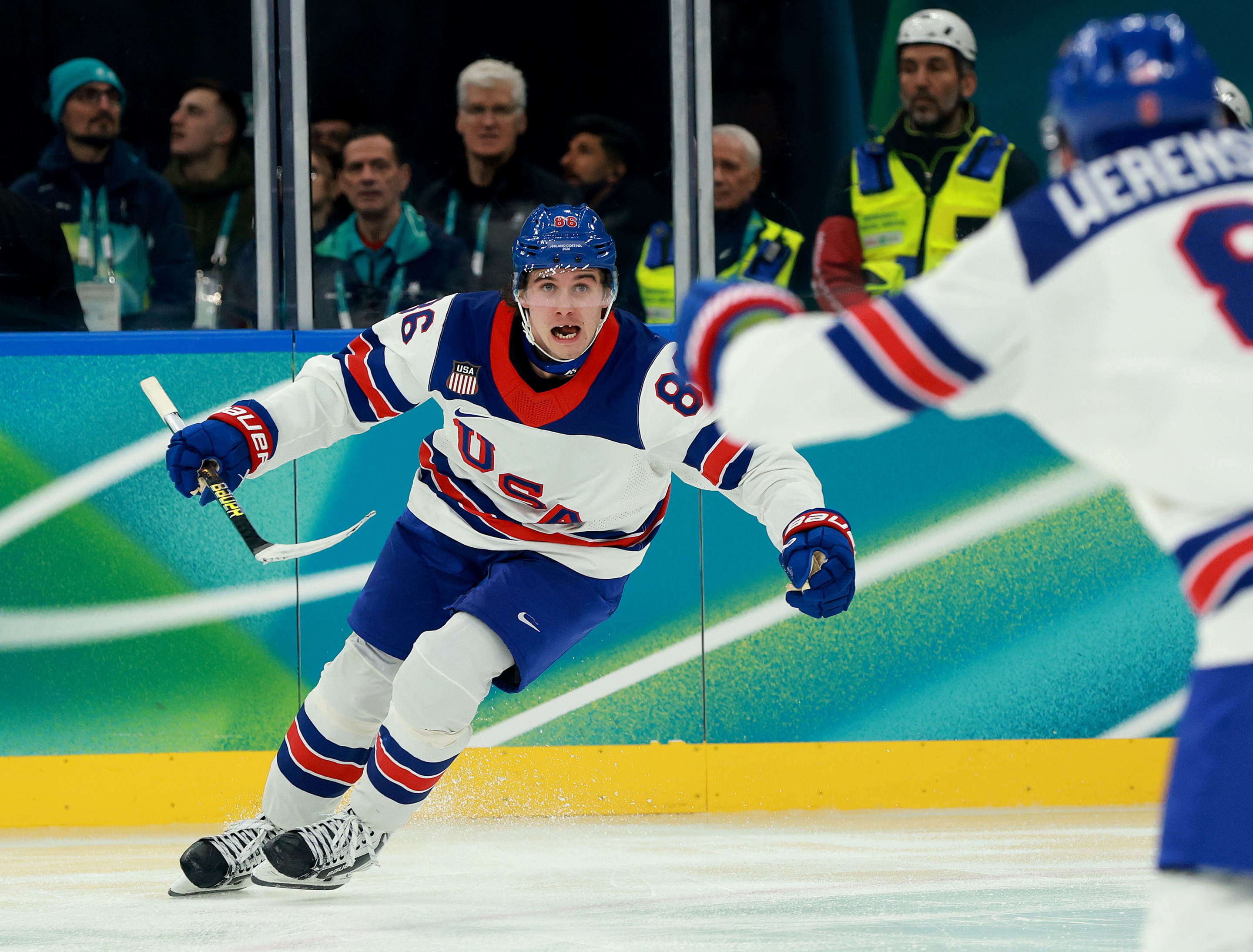 MILAN, ITALY - FEBRUARY 22: Jack Hughes #86 of Team United States celebrates scoring the game-winning goal in overtime during the Men's Gold Medal match between Canada and the United States on day 16 of the Milano Cortina 2026 Winter Olympic games at Milano Santagiulia Ice Hockey Arena on February 22, 2026 in Milan, Italy. Team United States defeated Team Canada 2-1 in overtime to win the Gold medal. (Photo by Elsa/Getty Images)