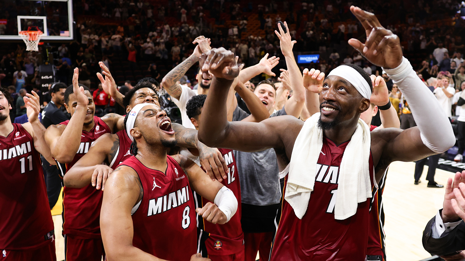 Bam Adebayo #13 of the Miami Heat celebrates with teammates after a 150-129 win against the Washington Wizards at Kaseya Center on March 10, 2026 in Miami, Florida