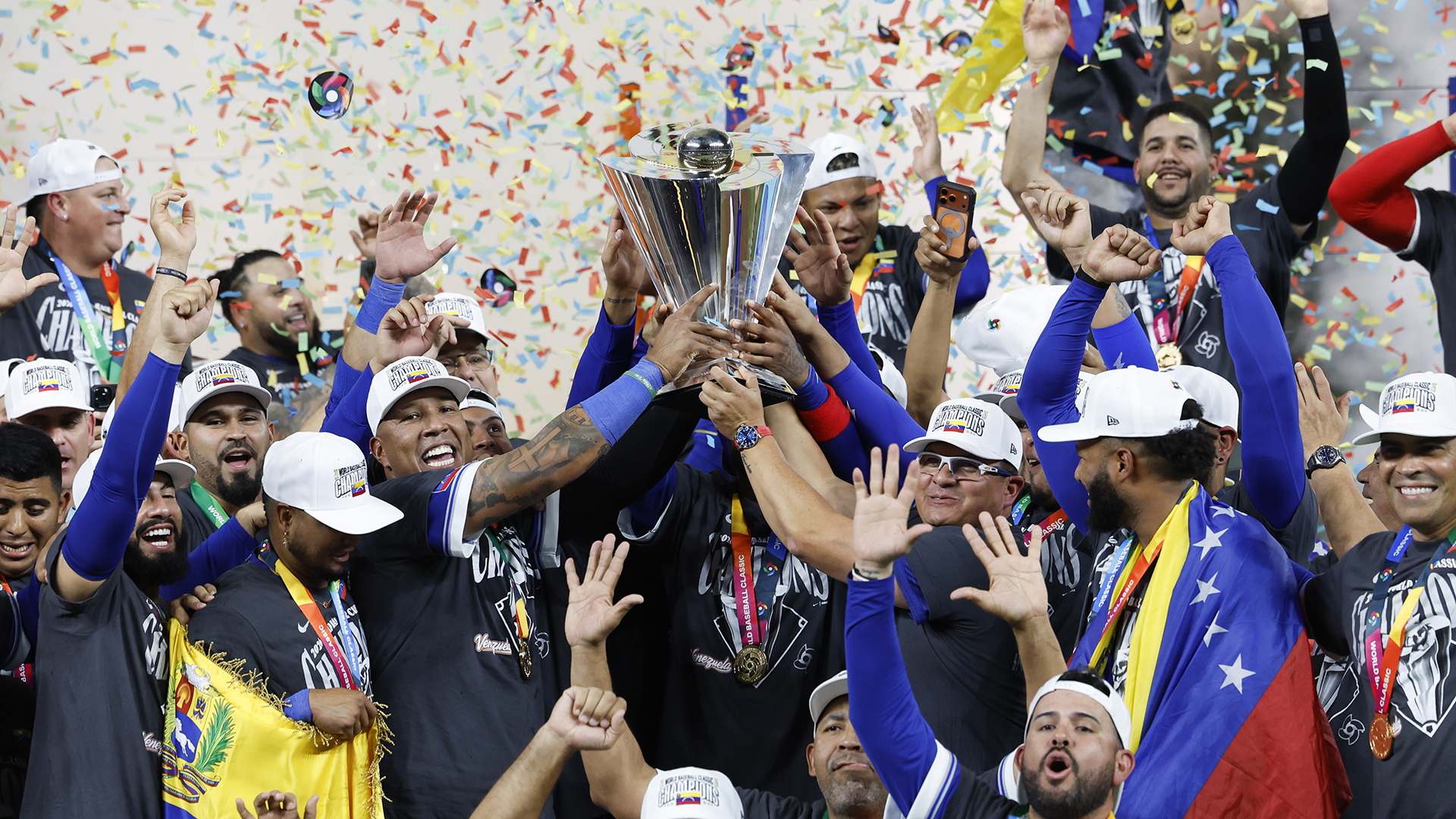 Members of Team Venezuela celebrate on the podium after the 2026 World Baseball Classic Championship game presented by Capital One between Team Venezuela and Team USA at loanDepot Park on Tuesday, March 17, 2026 in Miami, Florida.