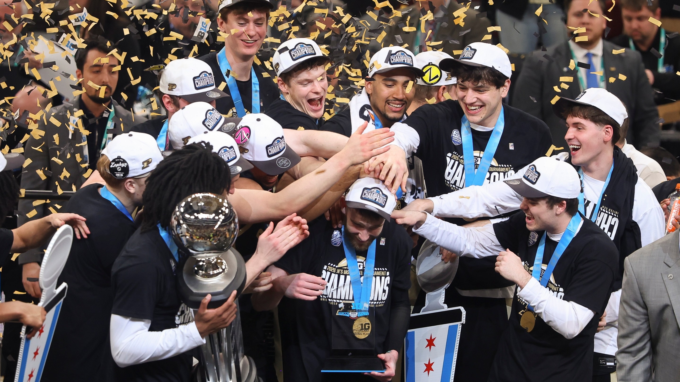 Braden Smith of the Purdue Boilermakers celebrates with his teammates after being named outstanding player of the tournament after winning the championship game of the Big Ten Men's Basketball Championships on March 15, 2026.