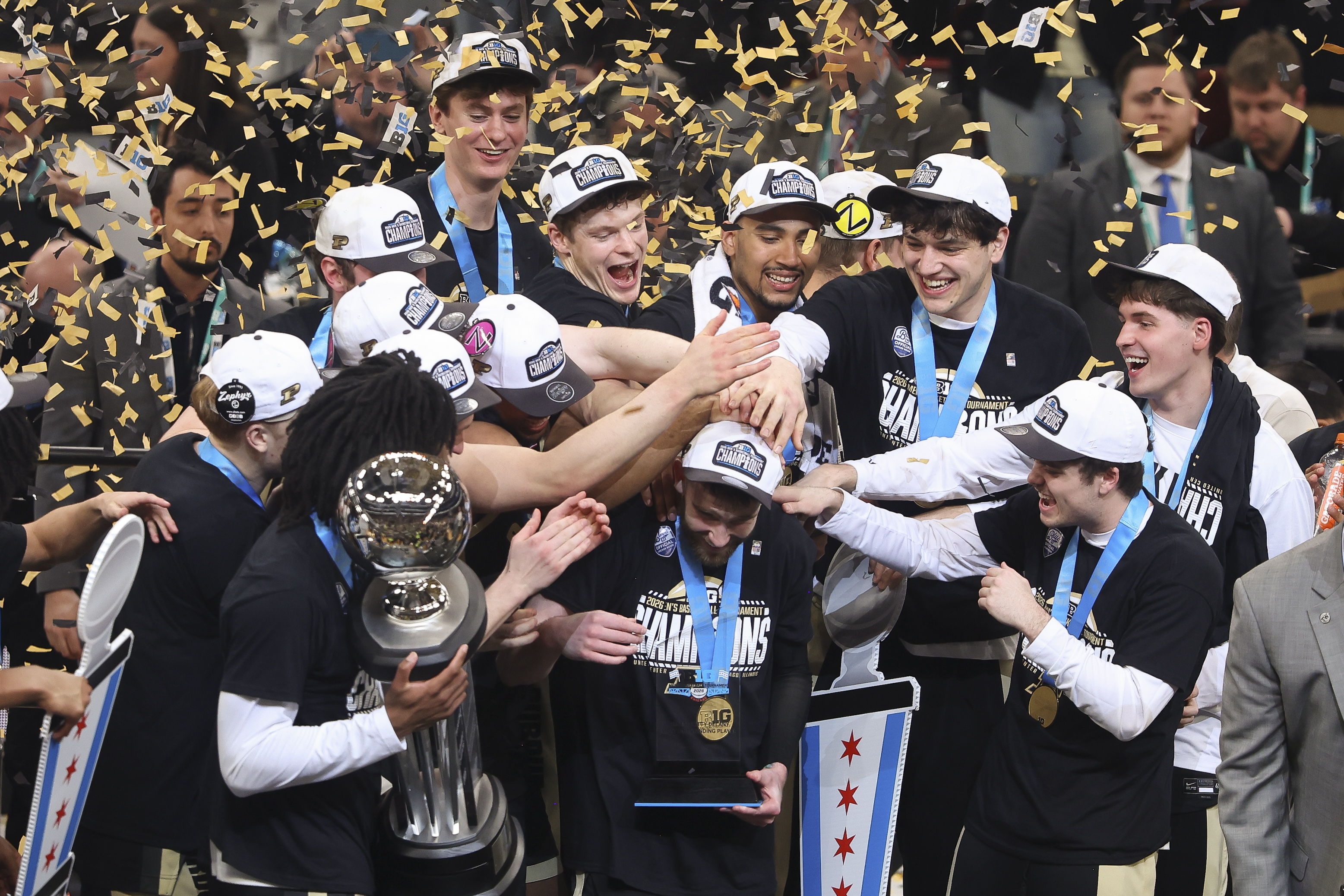 Braden Smith of the Purdue Boilermakers celebrates with his teammates after being named outstanding player of the tournament after winning the championship game of the Big Ten Men's Basketball Championships on March 15, 2026.