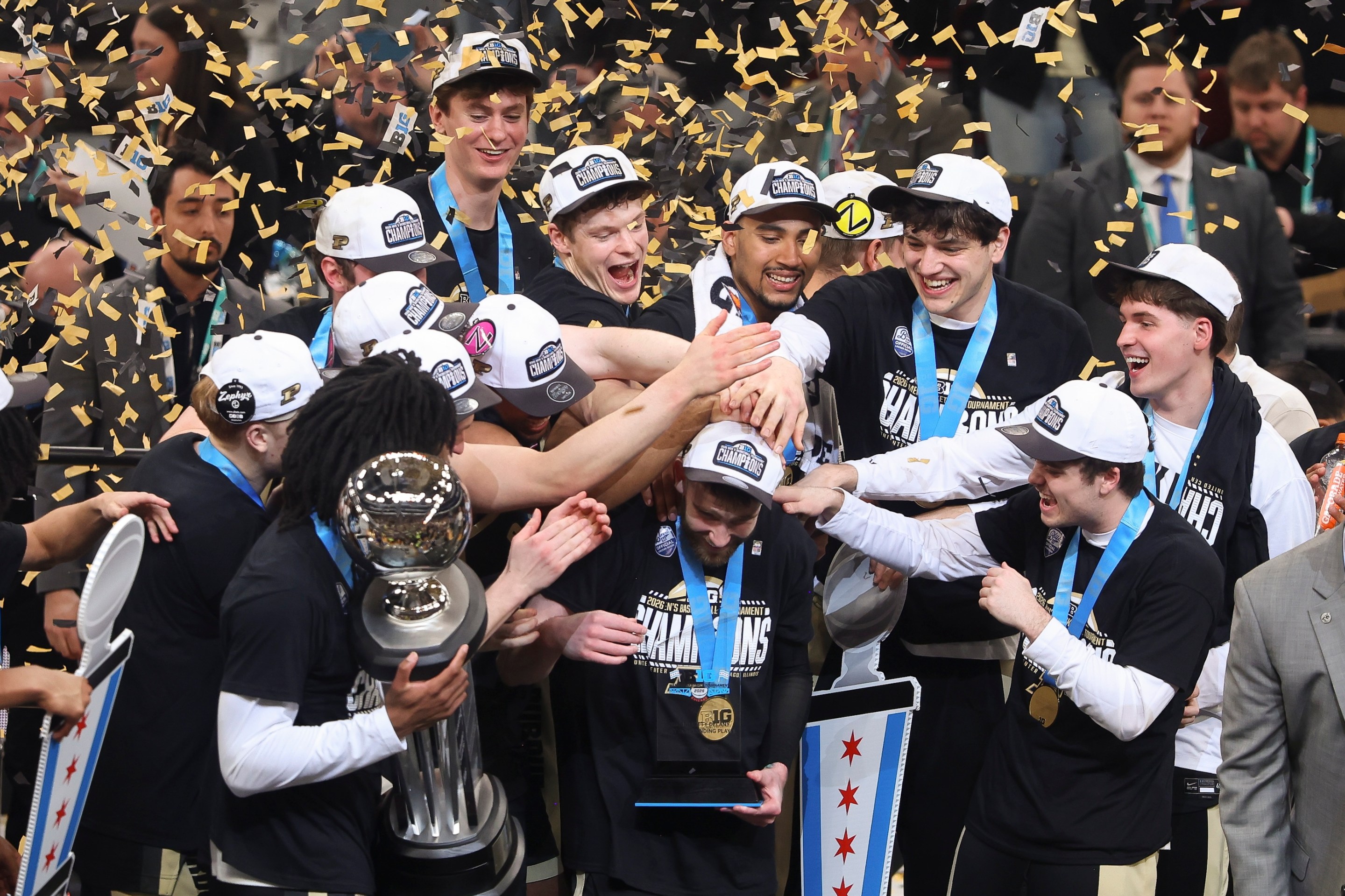 Braden Smith of the Purdue Boilermakers celebrates with his teammates after being named outstanding player of the tournament after winning the championship game of the Big Ten Men's Basketball Championships on March 15, 2026.