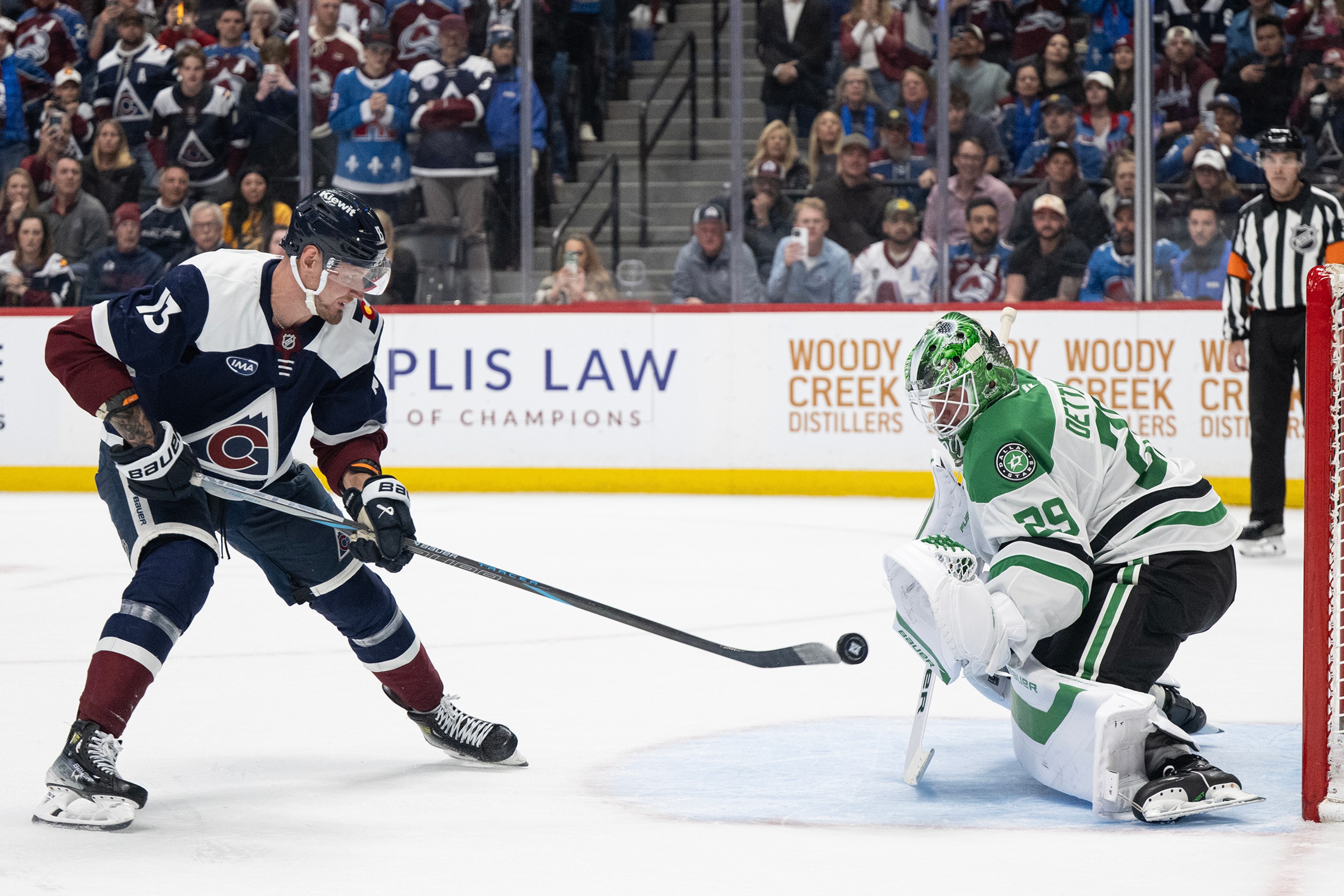 Goaltender Jake Oettinger (29) of the Dallas Stars saves a shot bu right wing Valeri Nichushkin