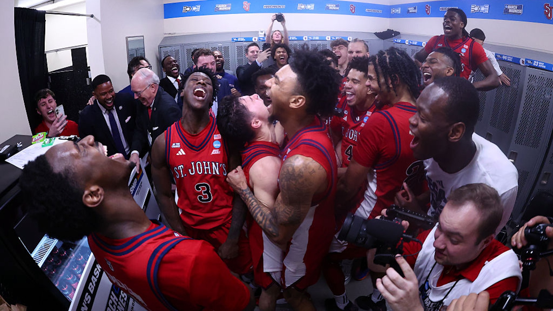 St. John's celebrates in the locker room