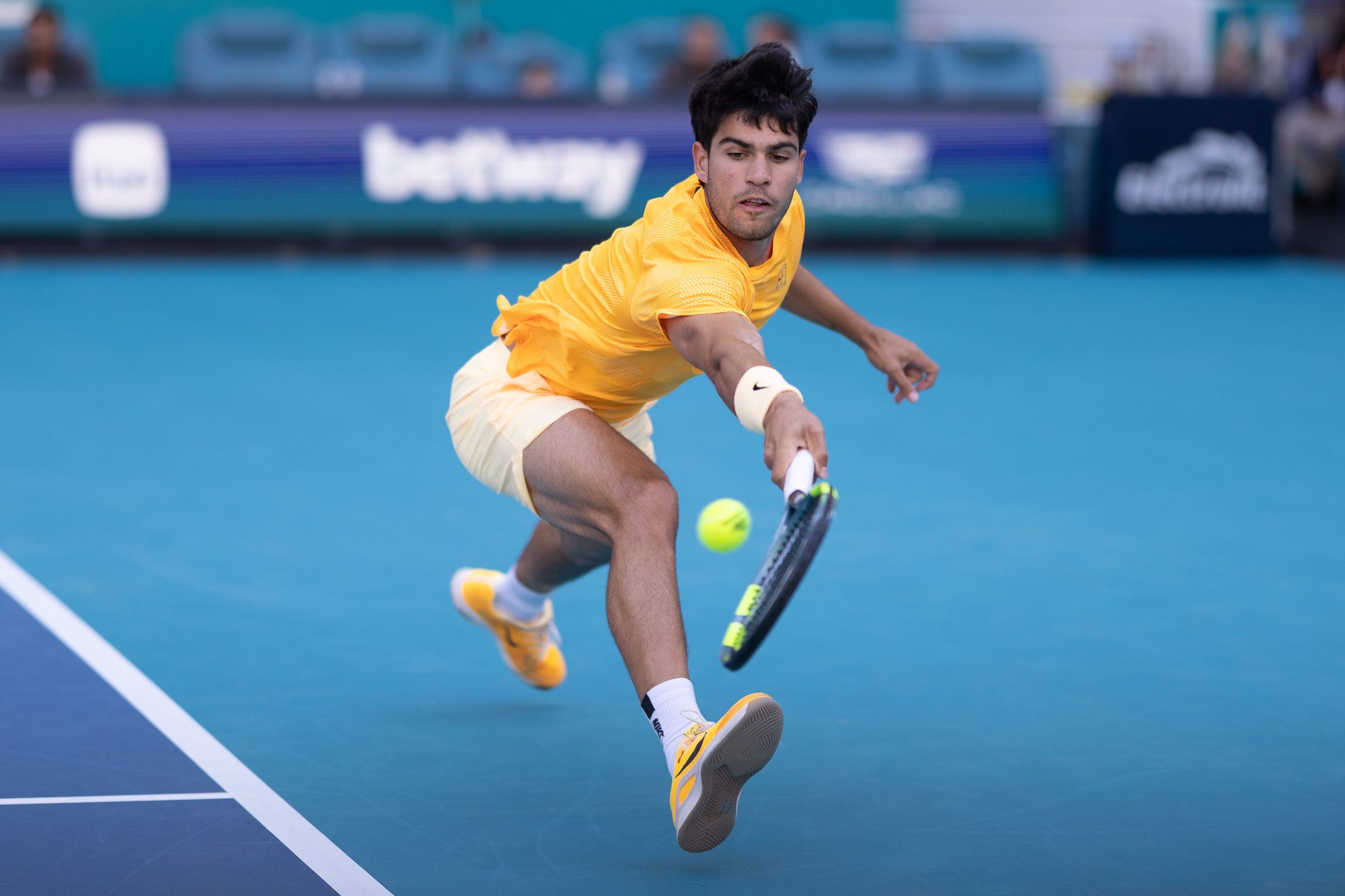 Carlos Alcaraz of Spain returns a shot against Sebastian Korda of the United States during their match on Day 6 of the Miami Open at Hard Rock Stadium in Miami Gardens, Florida, on March 22, 2026. (Photo by Mauricio Paiz/NurPhoto via Getty Images)