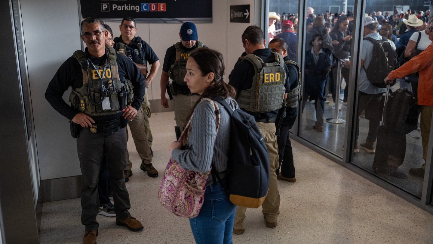 HOUSTON, TEXAS - MARCH 23:  Immigration and Customs Enforcement (I.C.E.) agents wait for an elevator at Terminal E at George Bush Intercontinental Airport on March 23, 2026 in Houston, Texas. The travel disruptions continue as hundreds of TSA agents quit or work without pay during a partial government shutdown. U.S. President Donald Trump deployed ICE agents to U.S. airports on Monday, with border czar Tom Homan in charge of the effort. (Photo by Antranik Tavitian/Getty Images)