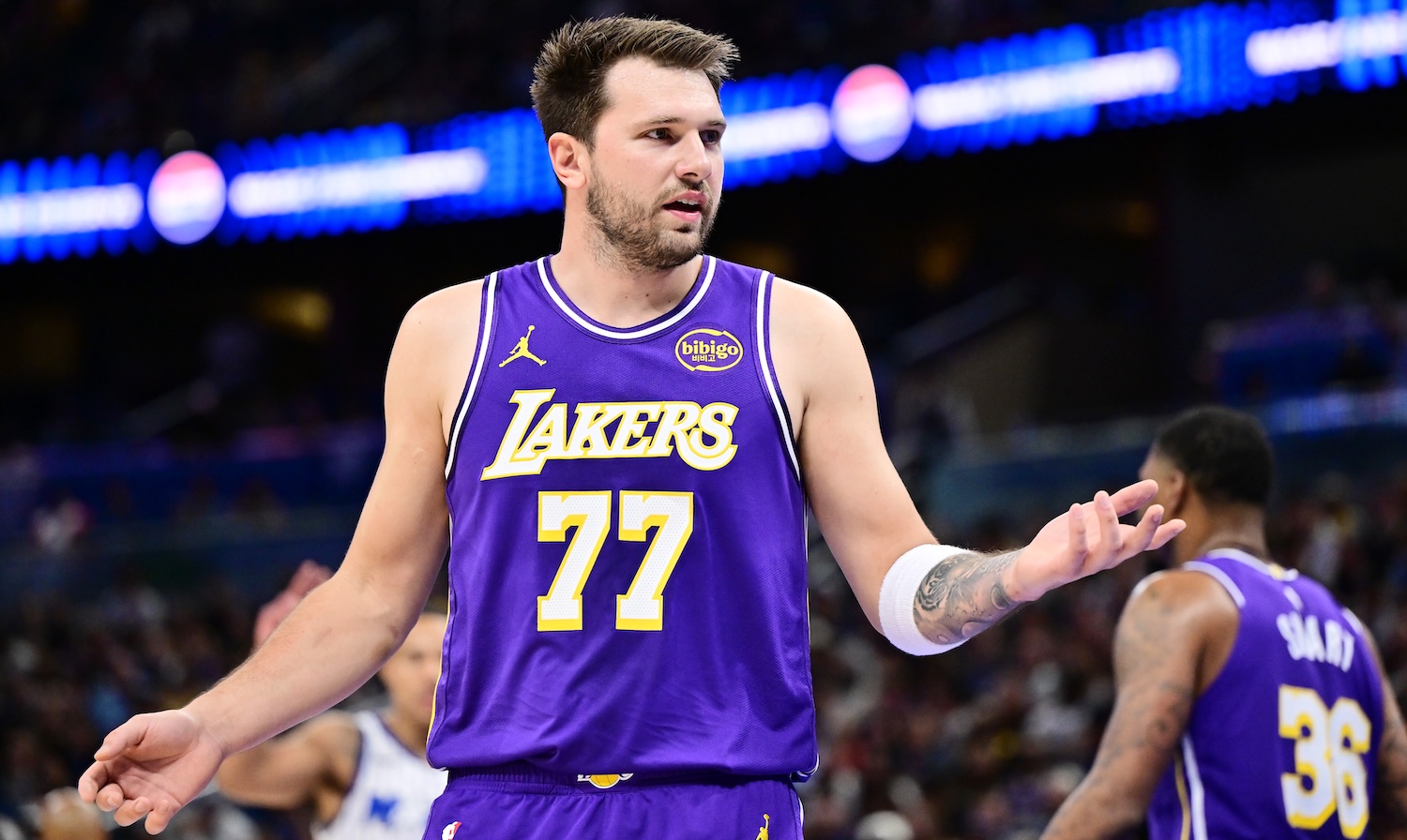 ORLANDO, FLORIDA - MARCH 21: Luka Doncic #77 of the Los Angeles Lakers reacts against the Orlando Magic at Kia Center on March 21, 2026 in Orlando, Florida. NOTE TO USER: User expressly acknowledges and agrees that, by downloading and or using this photograph, User is consenting to the terms and conditions of the Getty Images License Agreement. (Photo by Julio Aguilar/Getty Images)