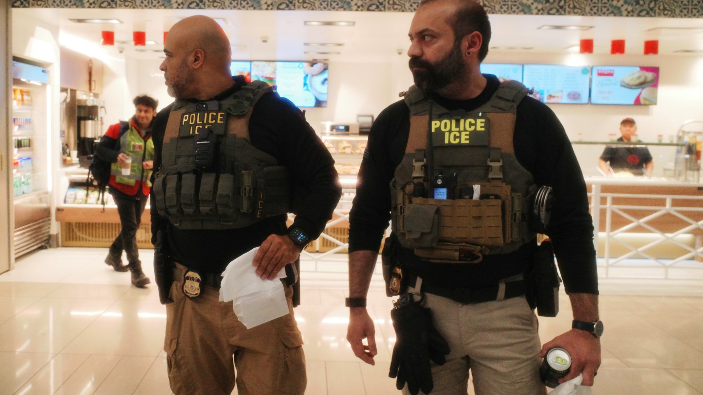 NEW YORK, NEW YORK - MARCH 23: Immigration and Customs Enforcement (ICE) agents patrol Terminal B at LaGuardia Airport on March 23, 2026 in New York City. The travel disruptions continue as hundreds of TSA agents quit or work without pay during a partial government shutdown. U.S. President Donald Trump said ICE agents will be deployed to U.S. airports on Monday, with border czar Tom Homan in charge of the effort. (Photo by Michael M. Santiago/Getty Images)