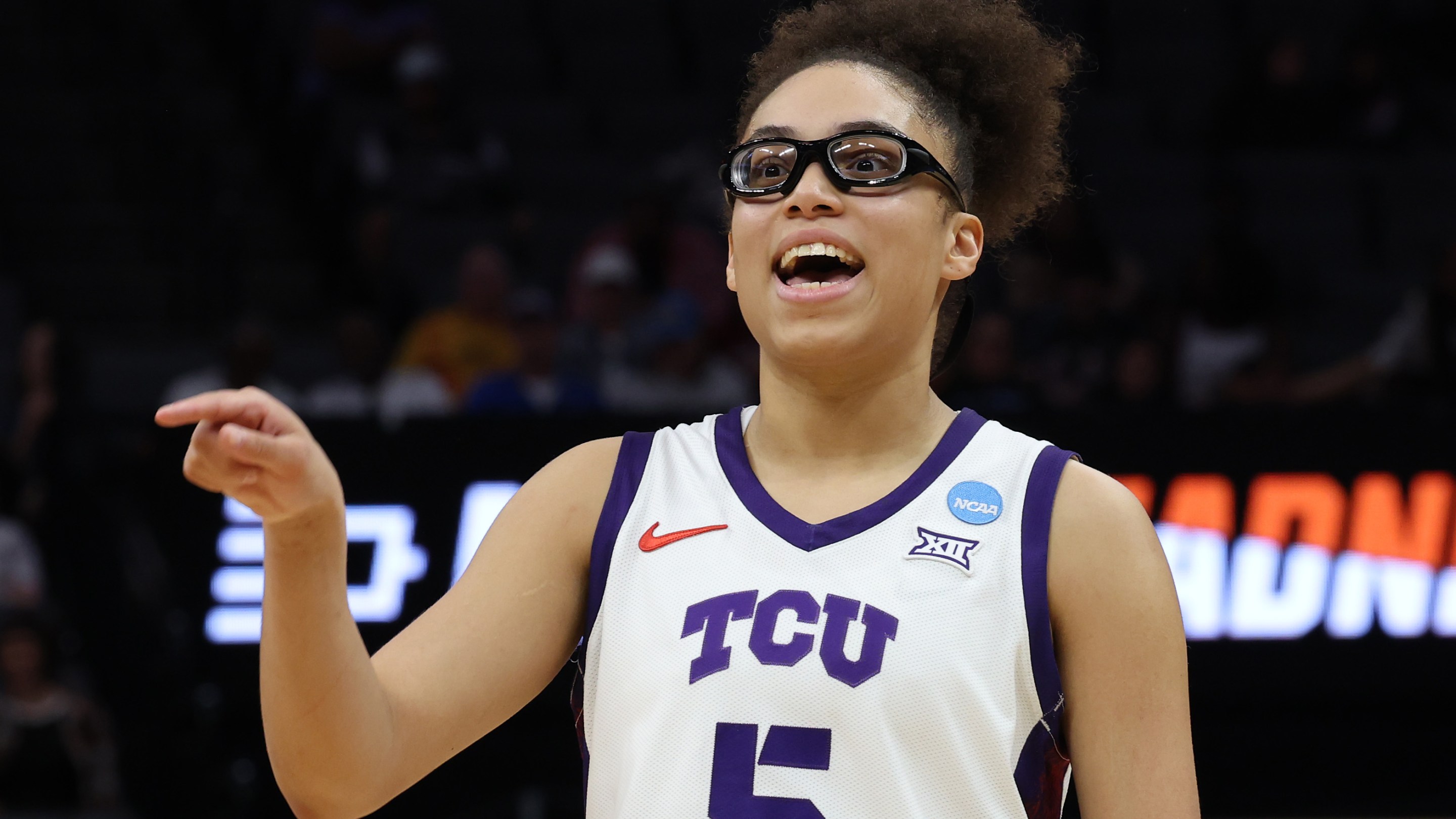 Olivia Miles #5 of the TCU Horned Frogs reacts against the Virginia Cavaliers during the fourth quarter in the Sweet Sixteen of the 2026 NCAA Women's Basketball Tournament at Golden 1 Center on March 28, 2026 in Sacramento, California.
