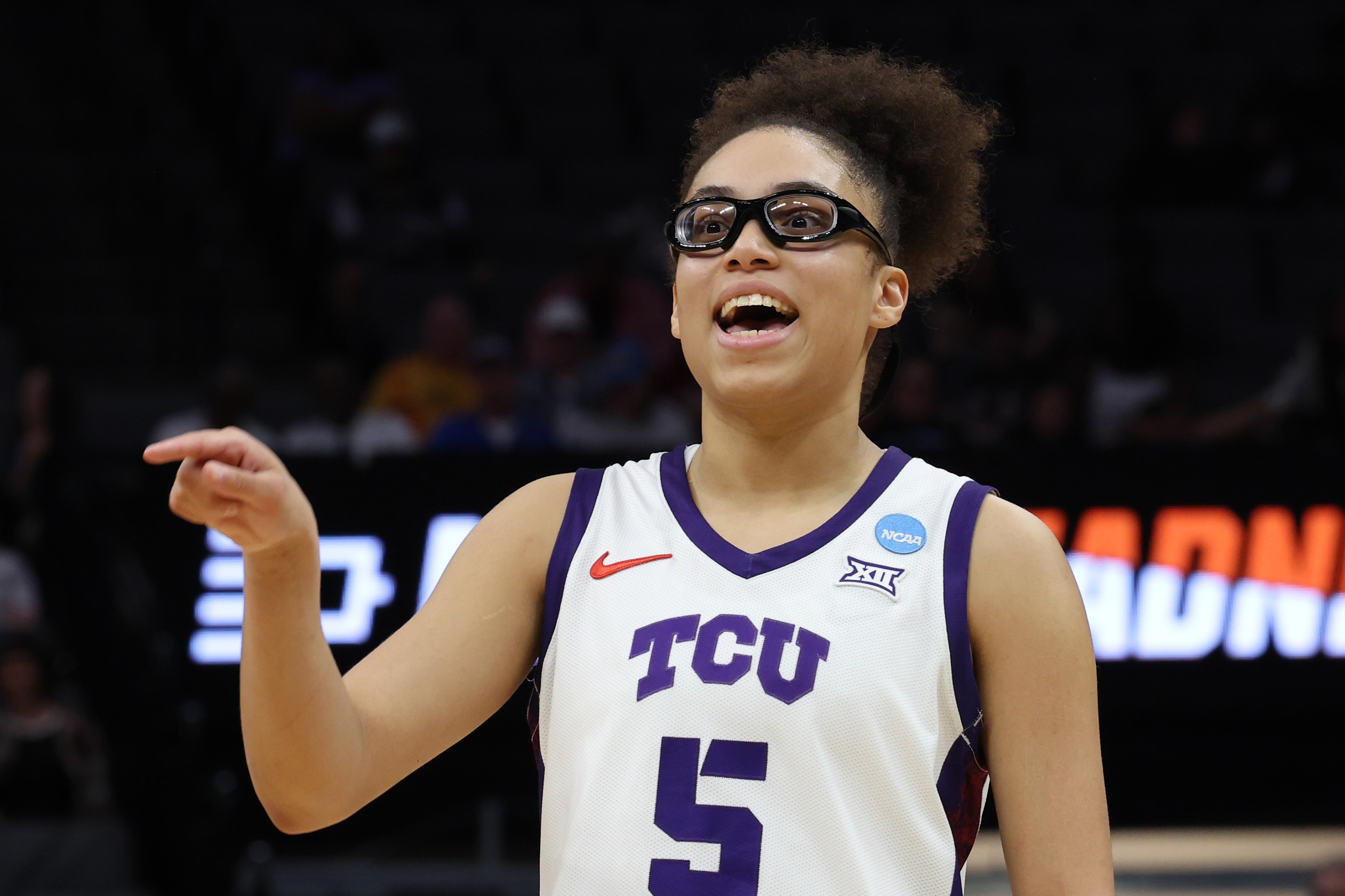 Olivia Miles #5 of the TCU Horned Frogs reacts against the Virginia Cavaliers during the fourth quarter in the Sweet Sixteen of the 2026 NCAA Women's Basketball Tournament at Golden 1 Center on March 28, 2026 in Sacramento, California.