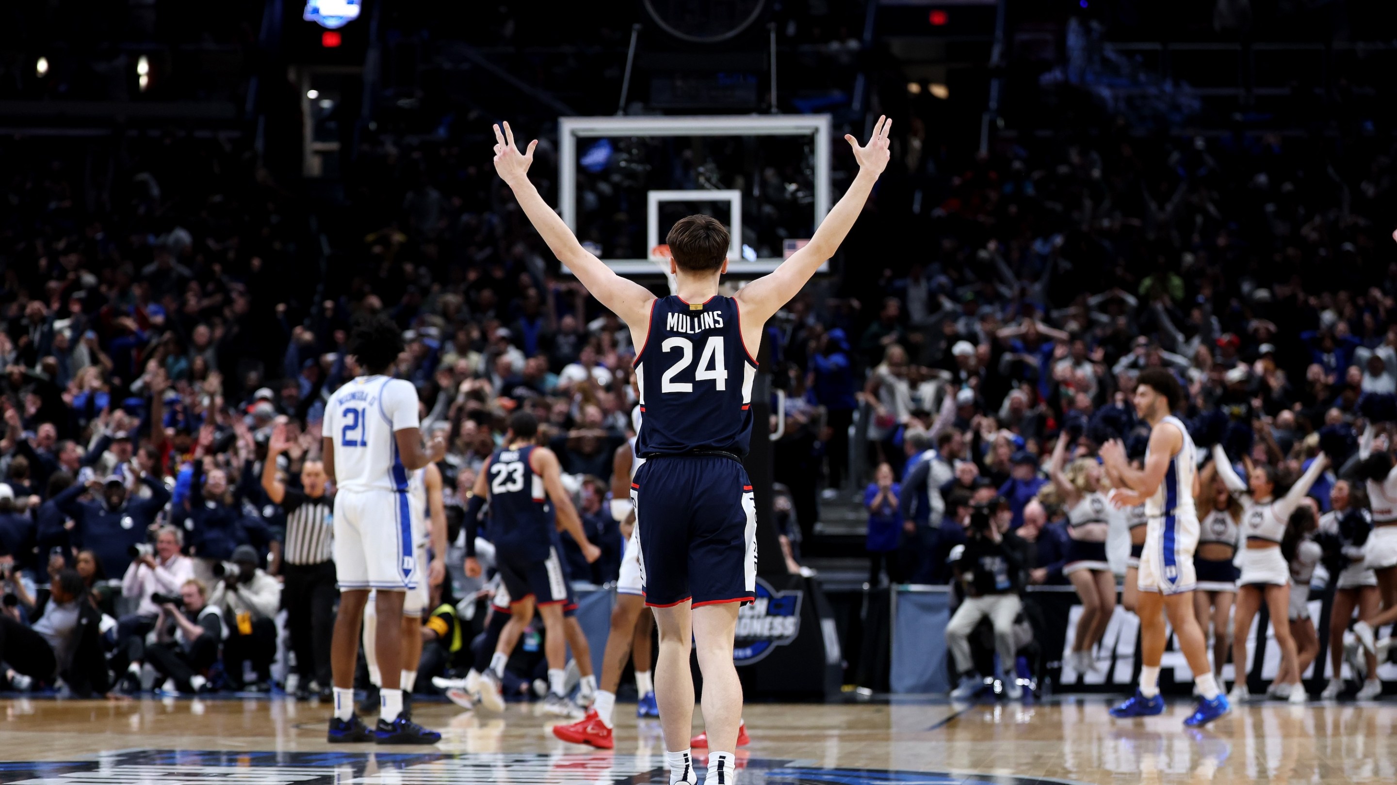 Braylon Mullins of the UConn Huskies celebrates after hitting the game-winner against Duke.