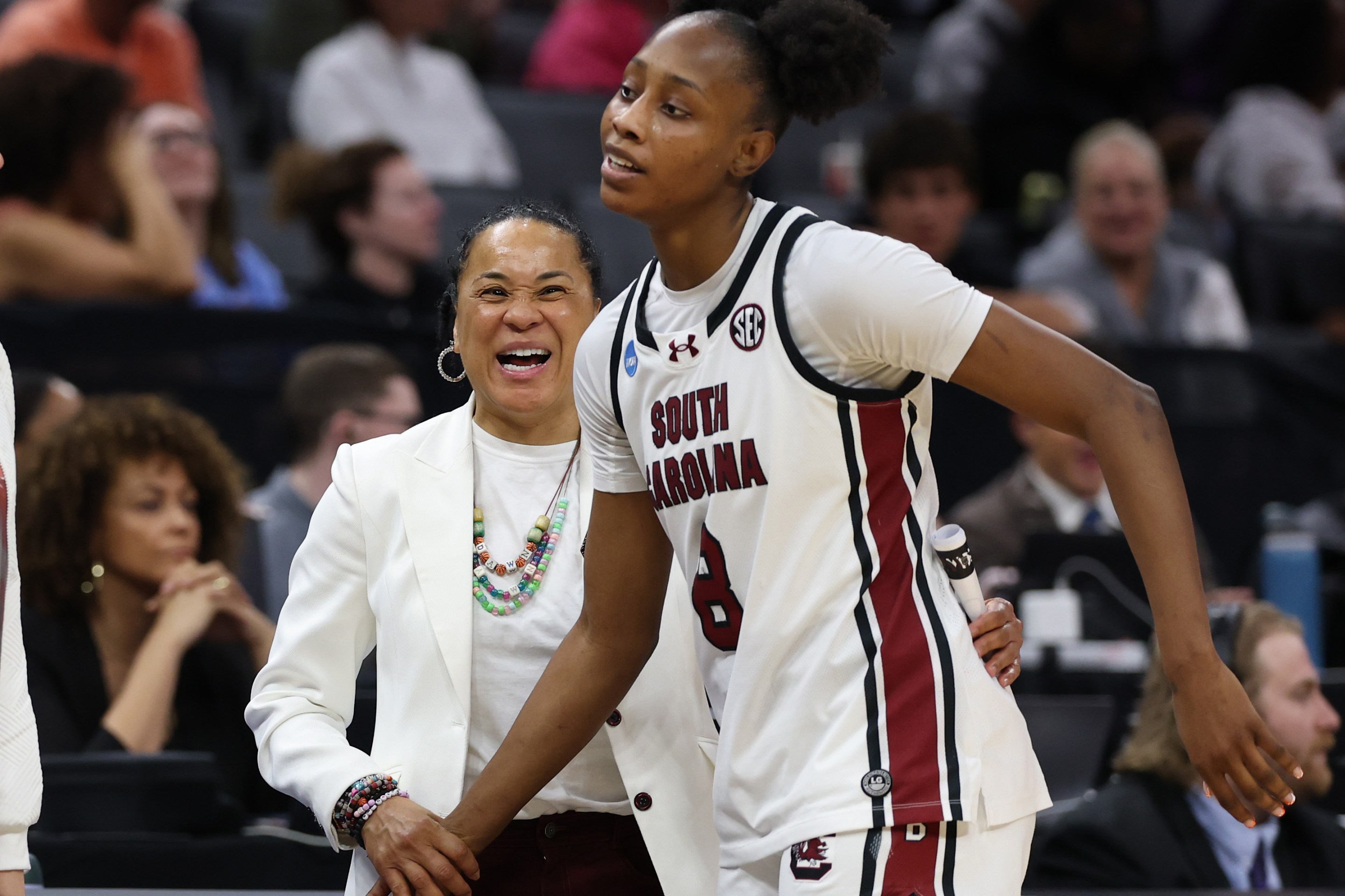 Head coach Dawn Staley of the South Carolina Gamecocks reacts with Joyce Edwards #8 in the game against the TCU Horned Frogs during the fourth quarter in the Elite Eight of the 2026 NCAA Women's Basketball Tournament at Golden 1 Center on March 30, 2026 in Sacramento, California.