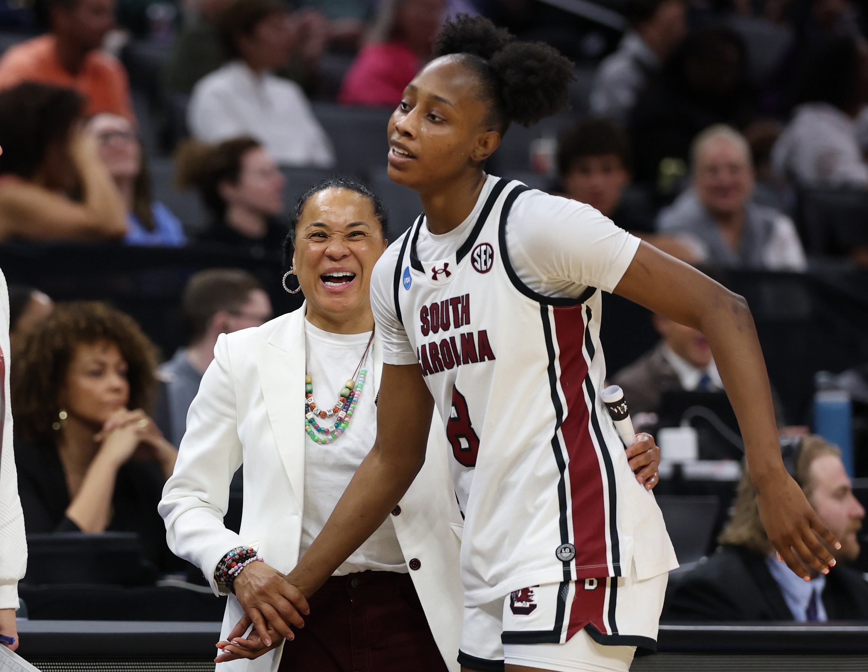 Head coach Dawn Staley of the South Carolina Gamecocks reacts with Joyce Edwards #8 in the game against the TCU Horned Frogs during the fourth quarter in the Elite Eight of the 2026 NCAA Women's Basketball Tournament at Golden 1 Center on March 30, 2026 in Sacramento, California.