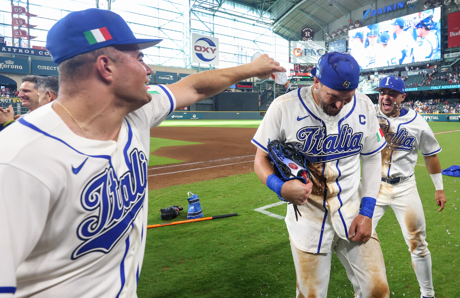 Vinnie Pasquantino #9 of Team Italy is showered with ice water by Jakob Marsee.